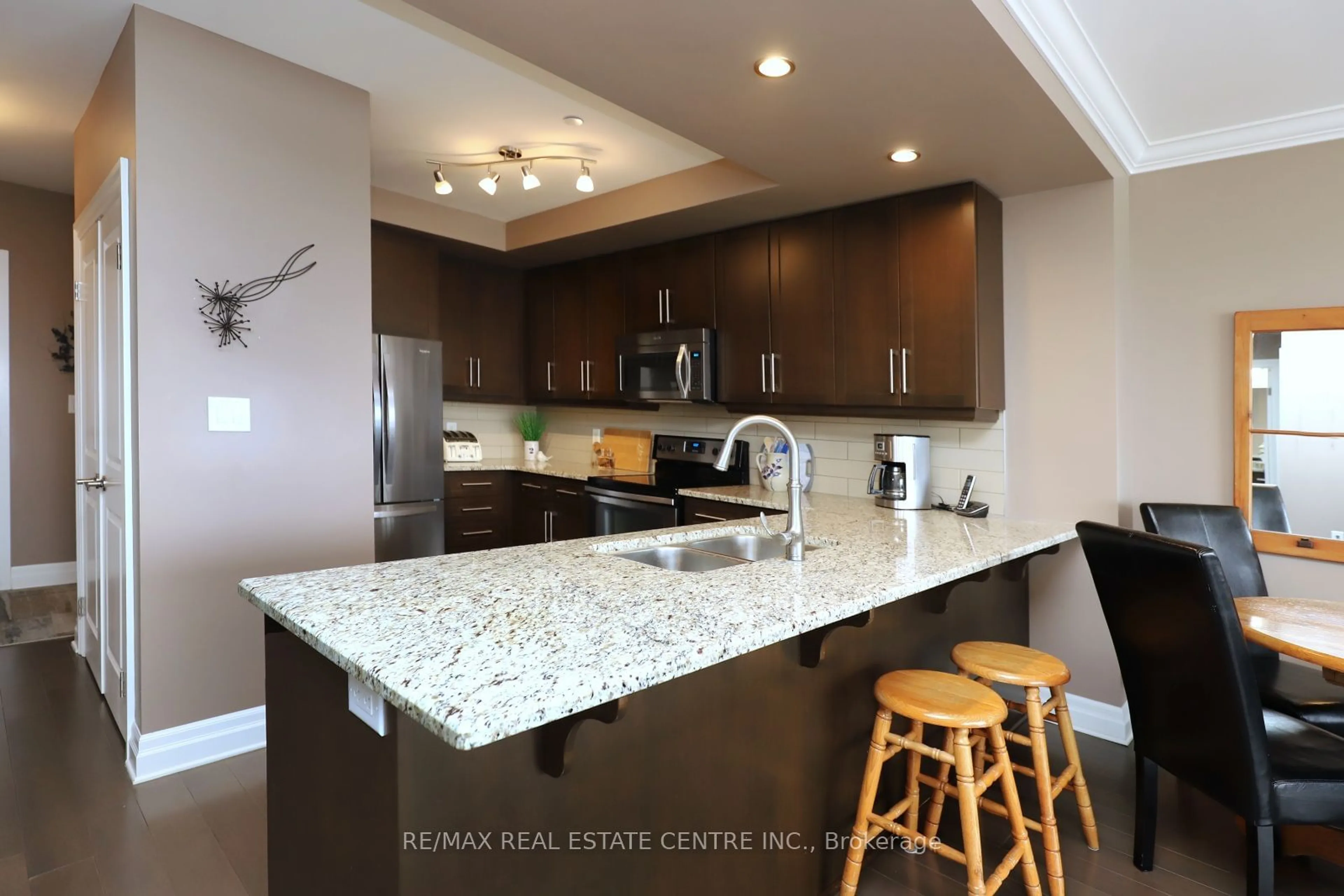 Open concept kitchen, ceramic/tile floor for 160 Macdonell St #1005, Guelph Ontario N1H 0A9