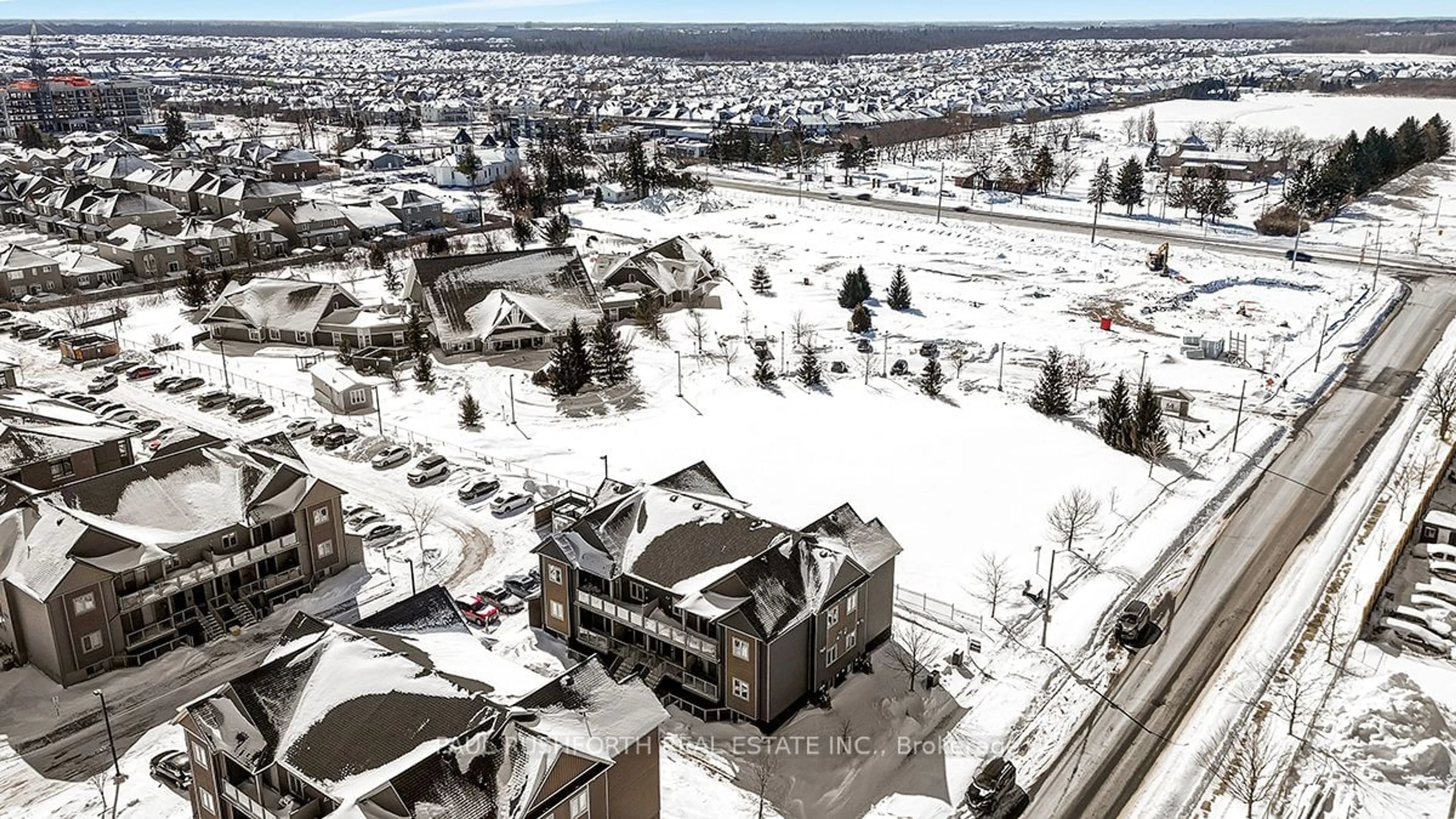 A pic from outside/outdoor area/front of a property/back of a property/a pic from drone, unknown for 277 Big Sky #7, Leitrim Ontario K1T 0M8