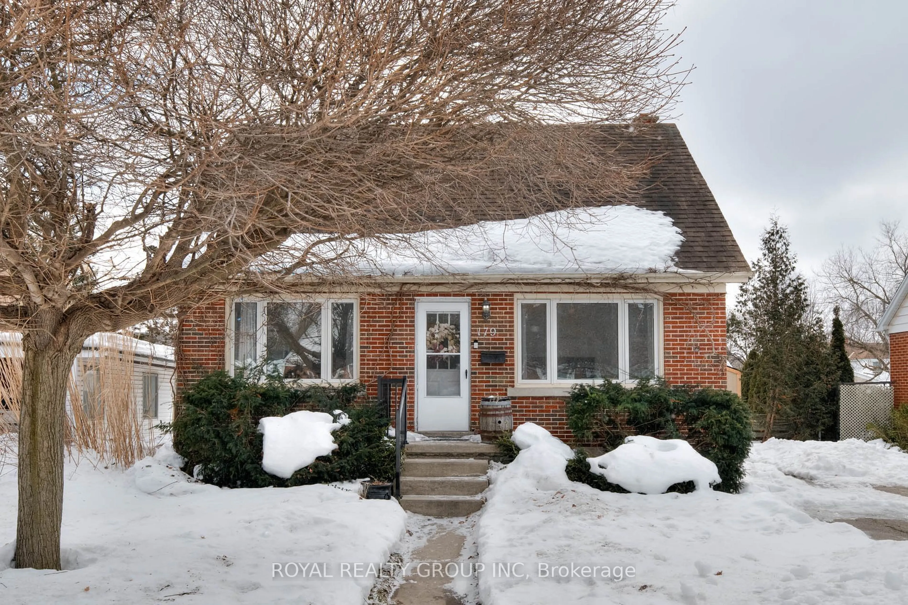 Home with brick exterior material, street for 179 Neilson Ave, Waterloo Ontario N2J 2L9