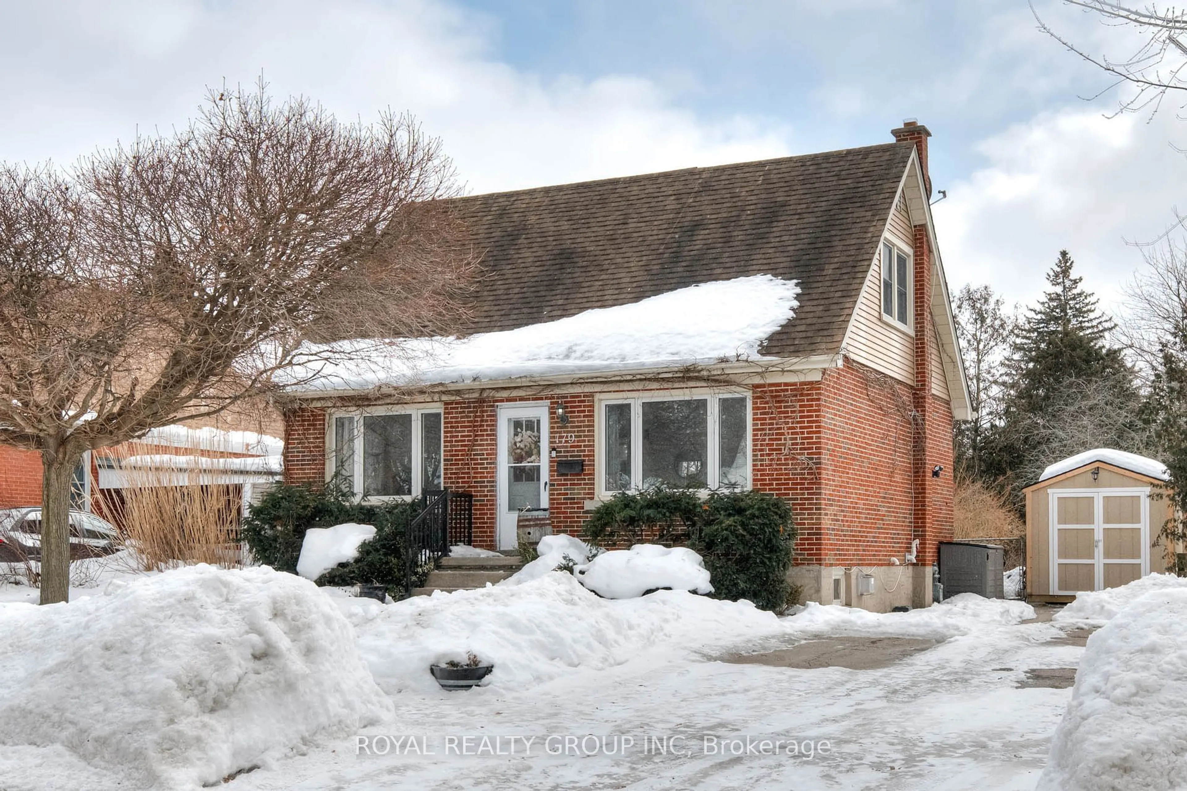 Home with brick exterior material, street for 179 Neilson Ave, Waterloo Ontario N2J 2L9