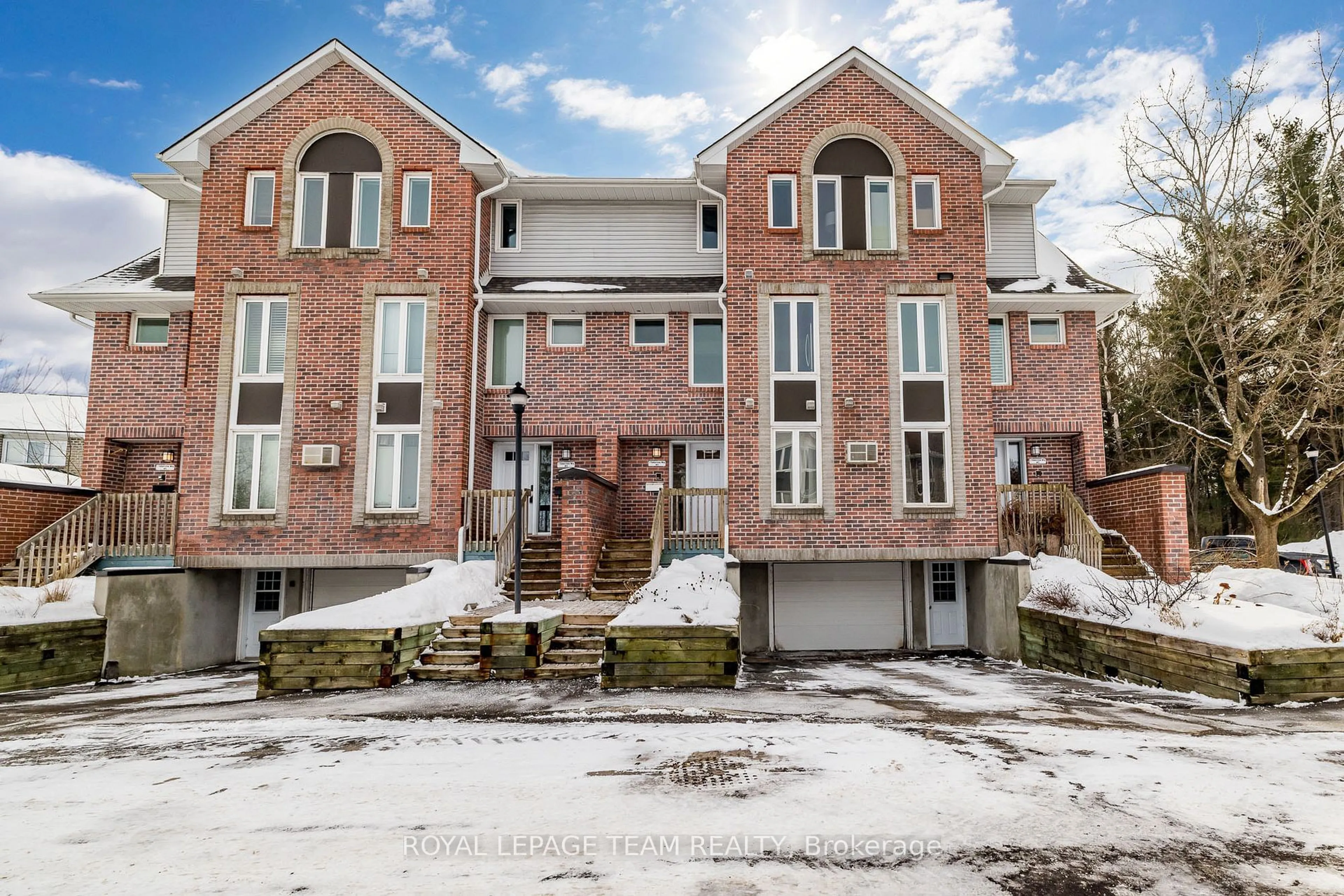 Home with brick exterior material, street for 1 Timberview Way #3, Bells Corners and South to Fallowfield Ontario K2H 9M7