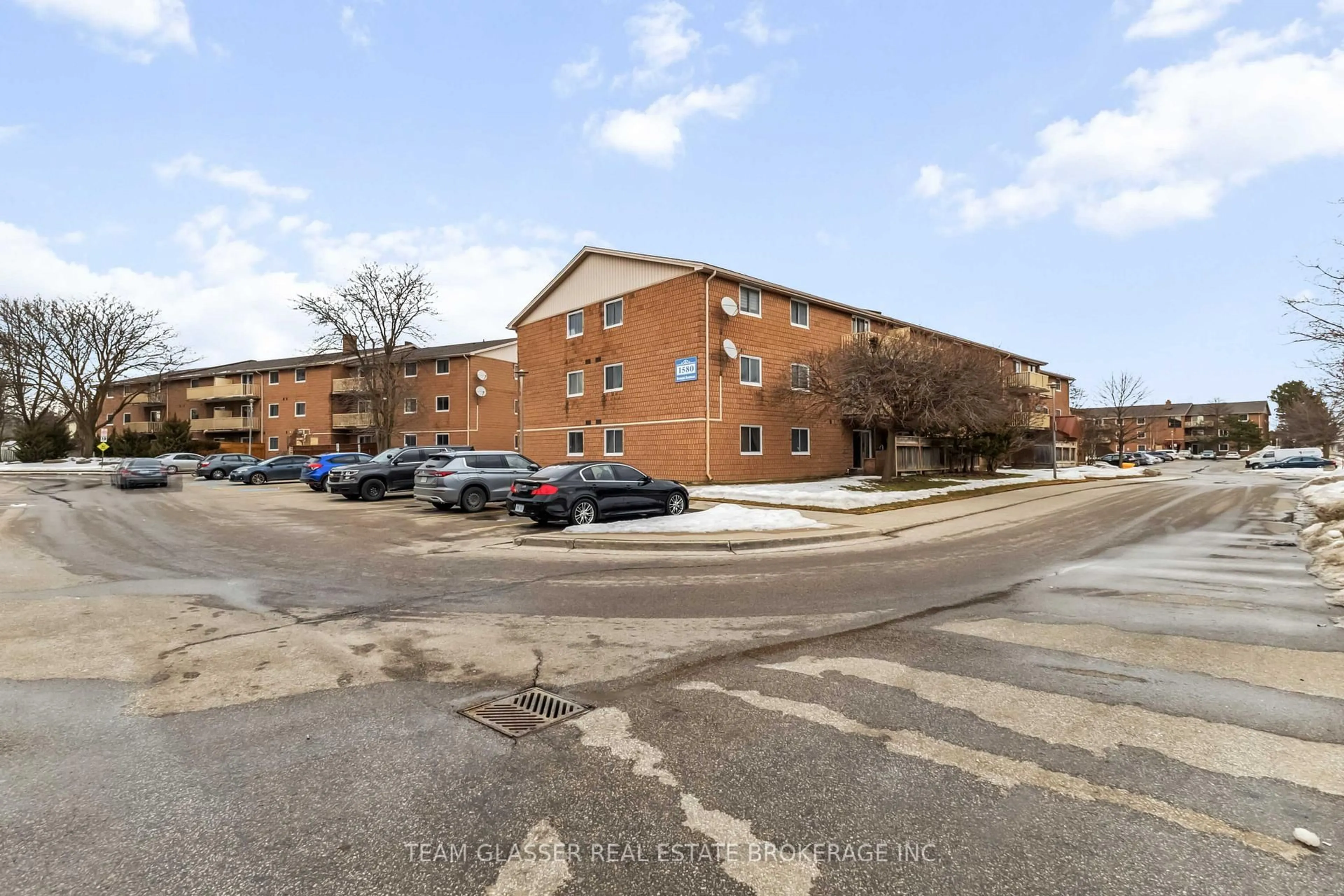 A pic from outside/outdoor area/front of a property/back of a property/a pic from drone, street for 1580 ERNEST Ave #306, London Ontario N6E 2T9