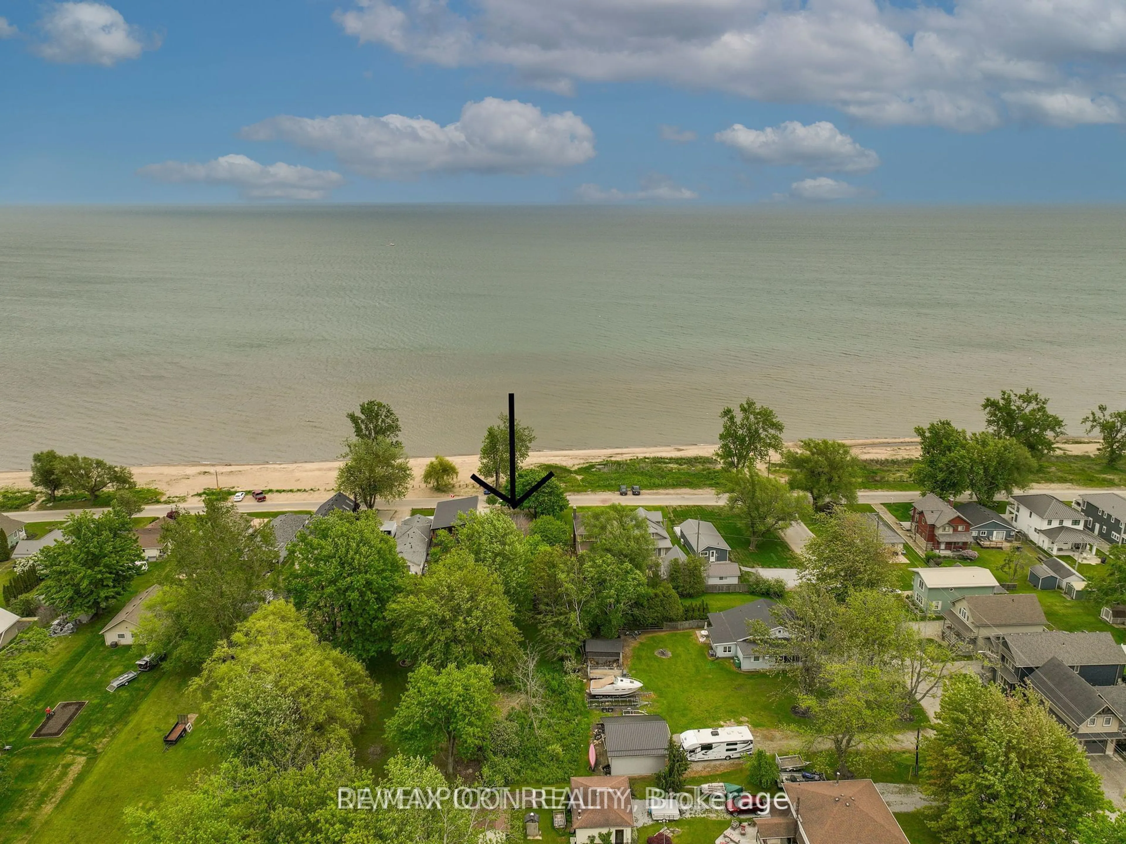 A pic from outside/outdoor area/front of a property/back of a property/a pic from drone, water/lake/river/ocean view for 77 Ordnance Ave, Norfolk Ontario N0E 1T0