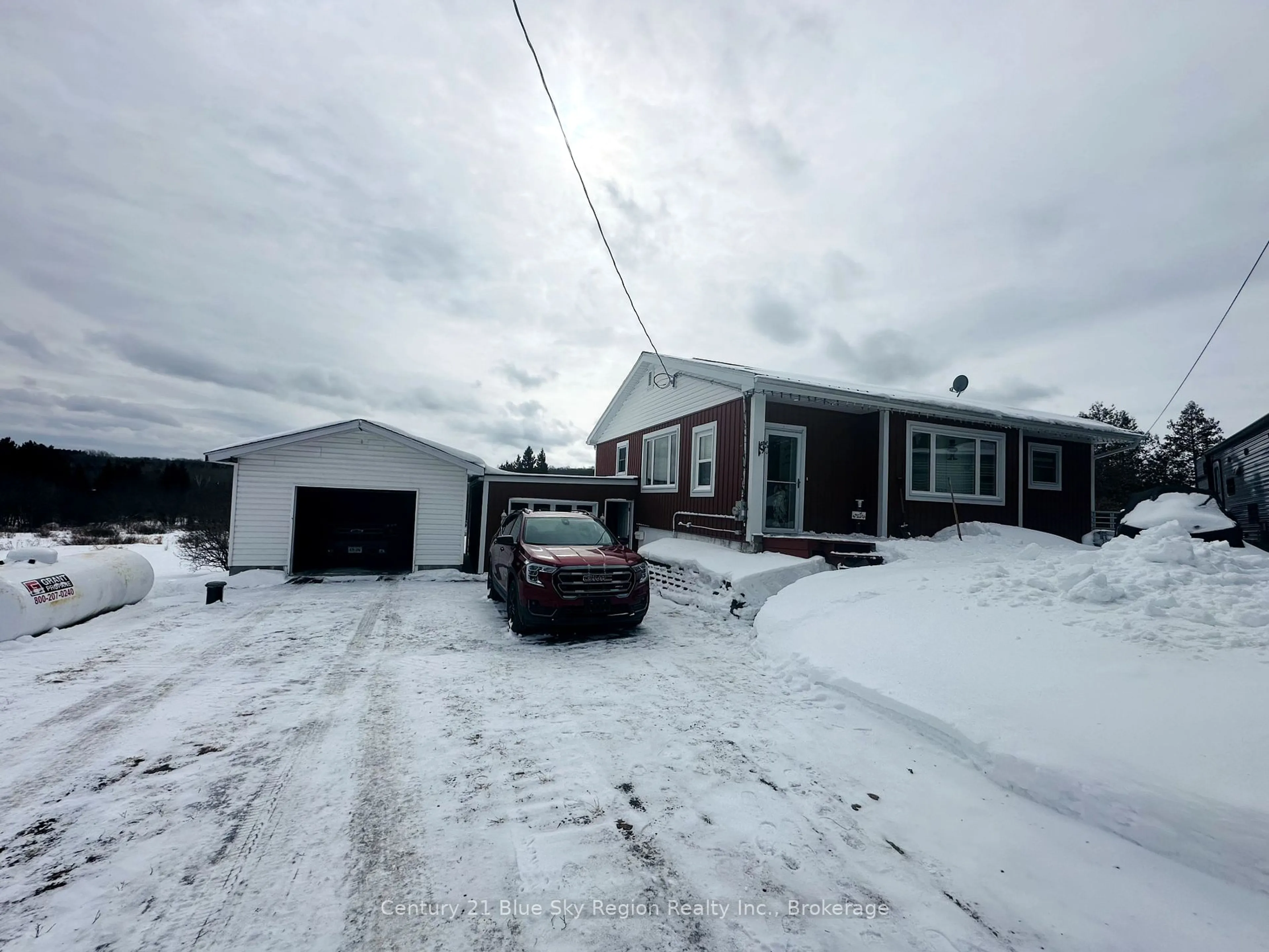 A pic from outside/outdoor area/front of a property/back of a property/a pic from drone, street for 405 HIGHWAY 654, Callander Ontario P0H 1H0