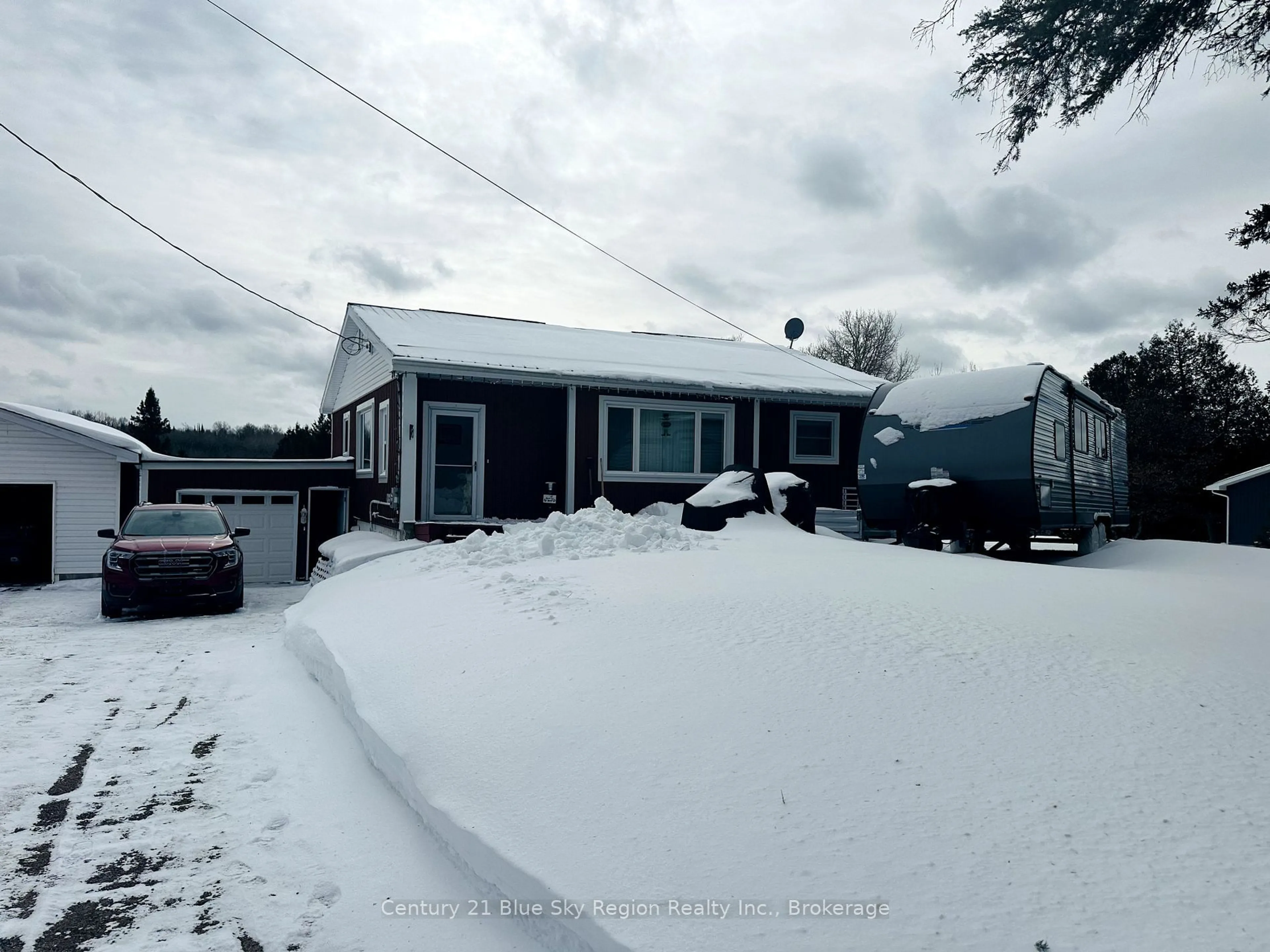 A pic from outside/outdoor area/front of a property/back of a property/a pic from drone, street for 405 HIGHWAY 654, Callander Ontario P0H 1H0