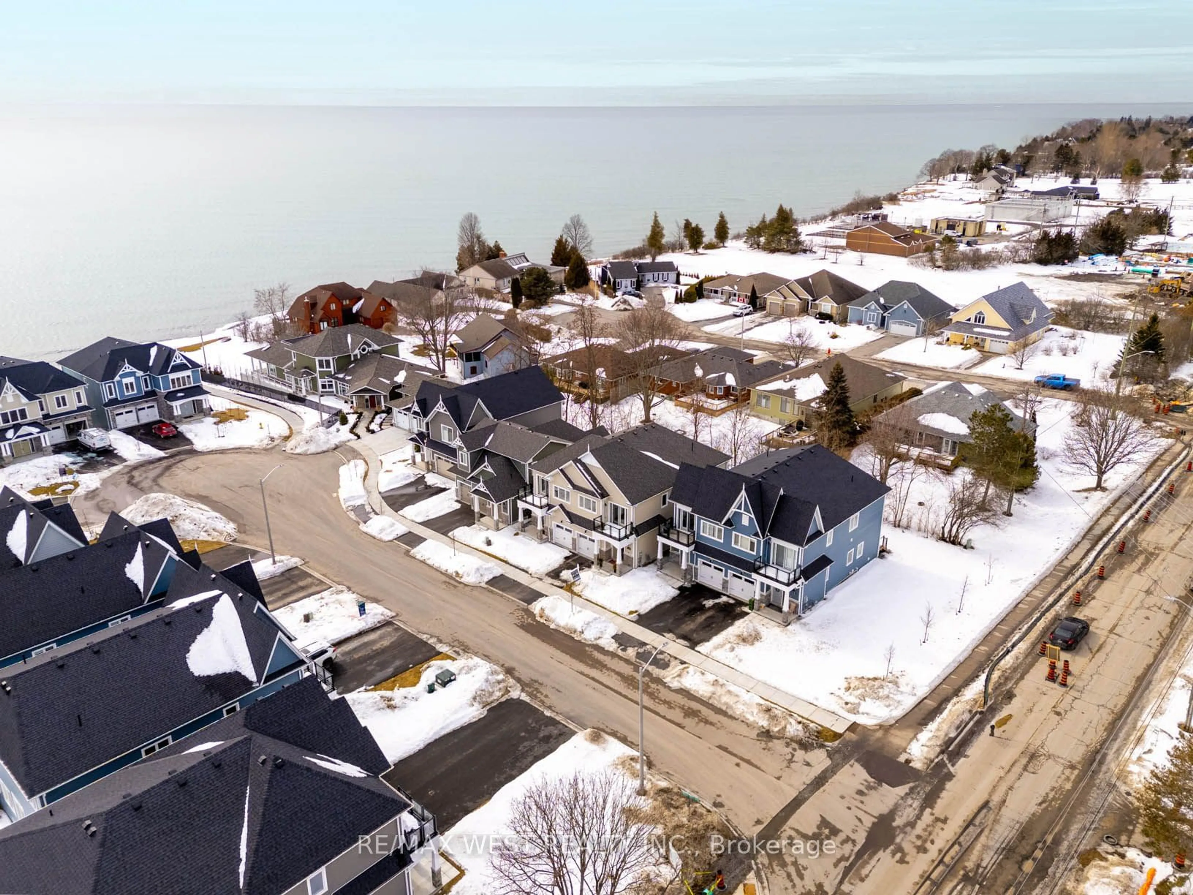 A pic from outside/outdoor area/front of a property/back of a property/a pic from drone, street for 7 Twelve Trees Crt, Prince Edward County Ontario K0K 3L0