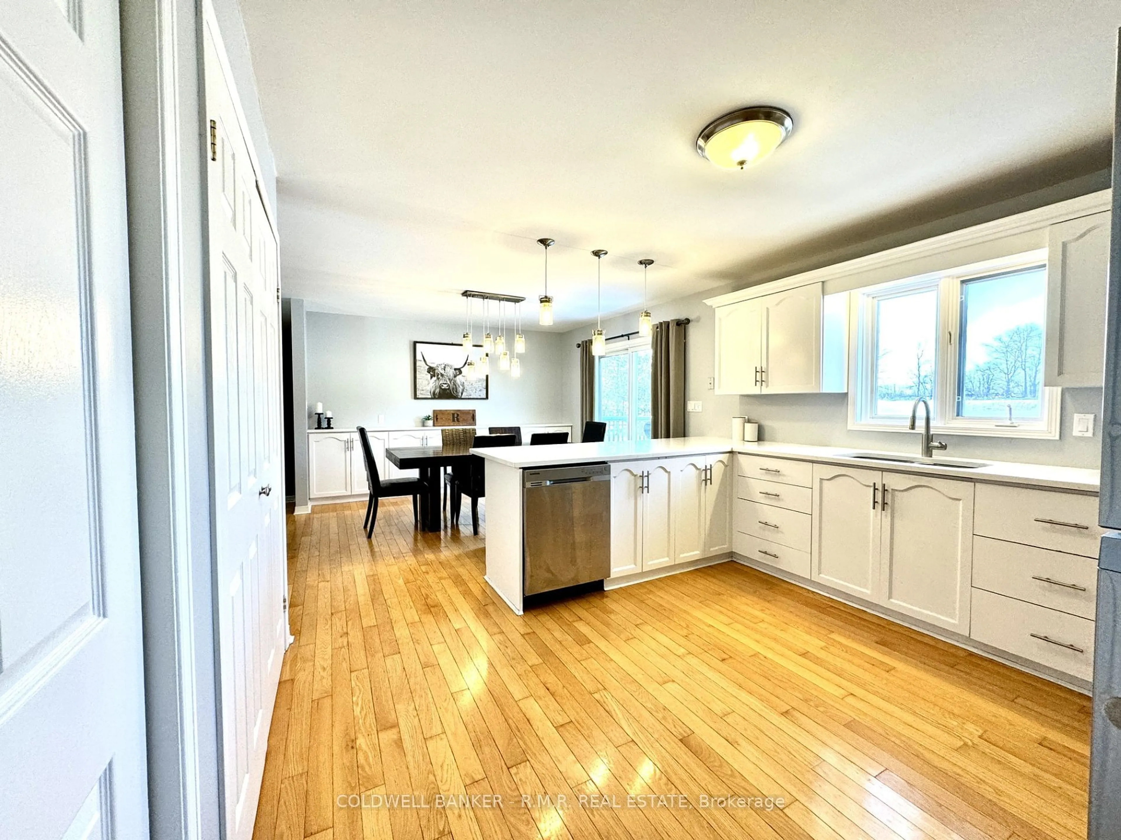 Open concept kitchen, wood/laminate floor for 61 Spry Rd, Marmora and Lake Ontario K0K 1M0