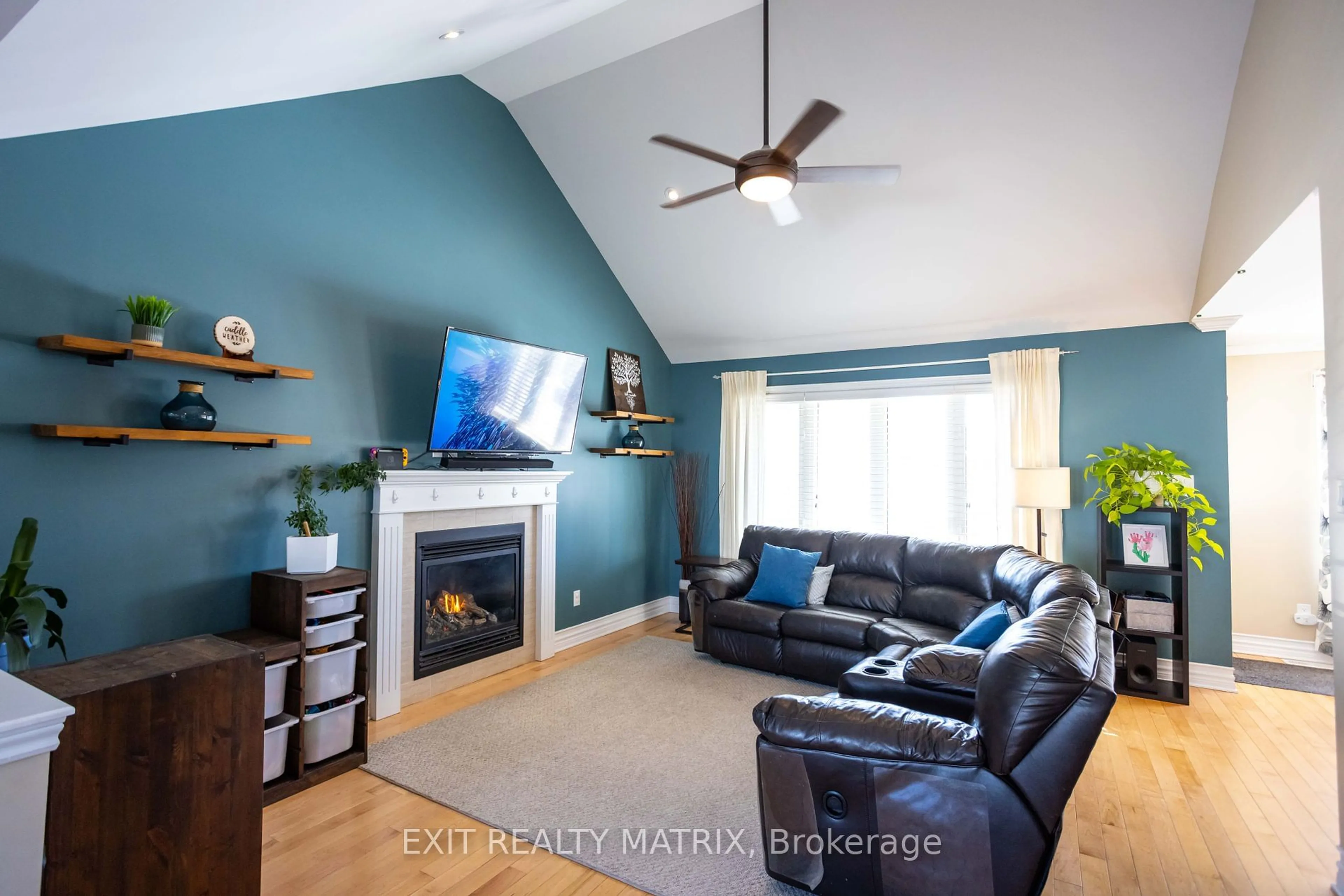 Living room with furniture, wood/laminate floor for 862 Oceane St, The Nation Ontario K0A 2M0