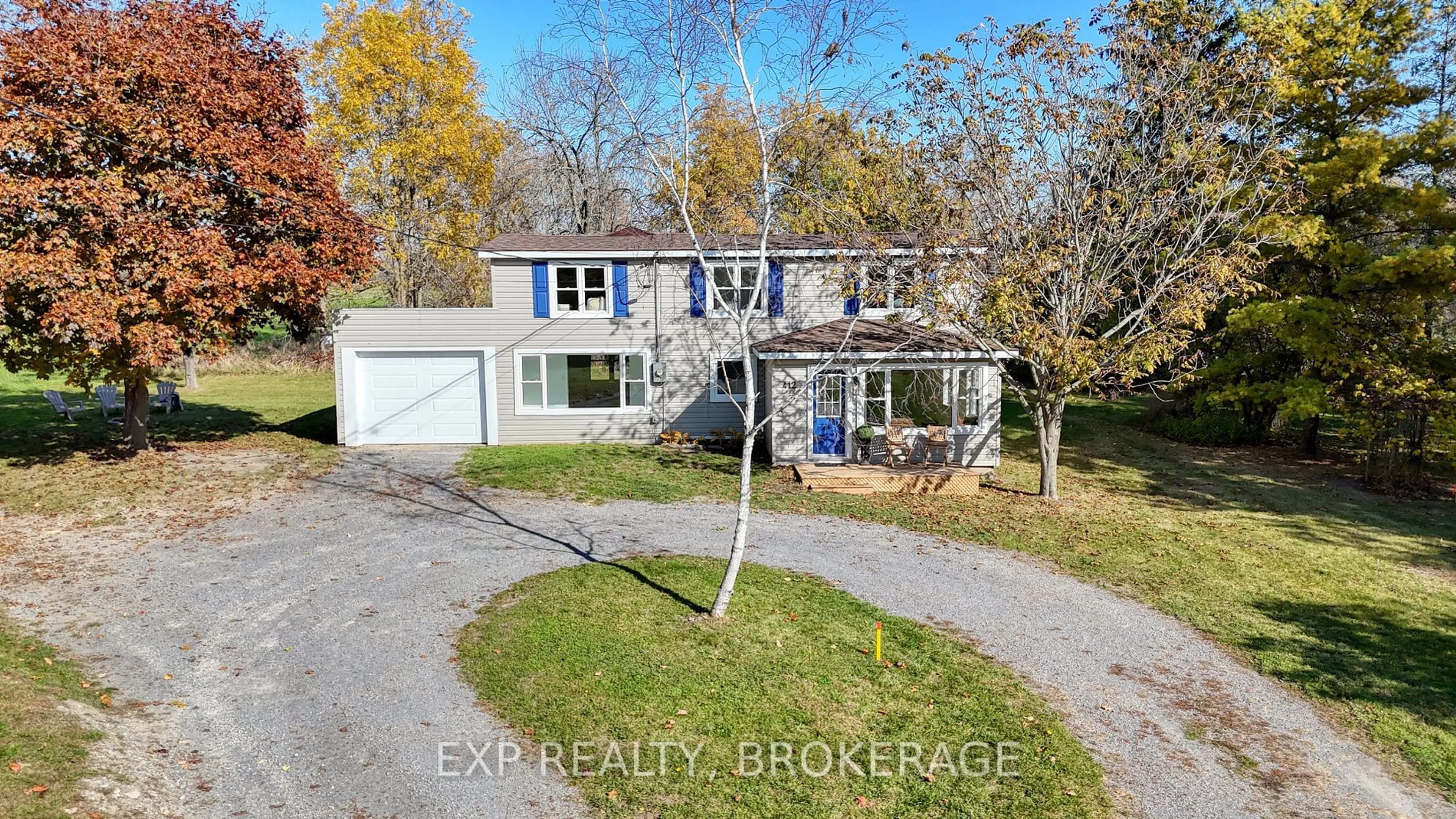 A pic from outside/outdoor area/front of a property/back of a property/a pic from drone, street for 412 BLOOMFIELD MAIN St, Prince Edward County Ontario K0K 1G0