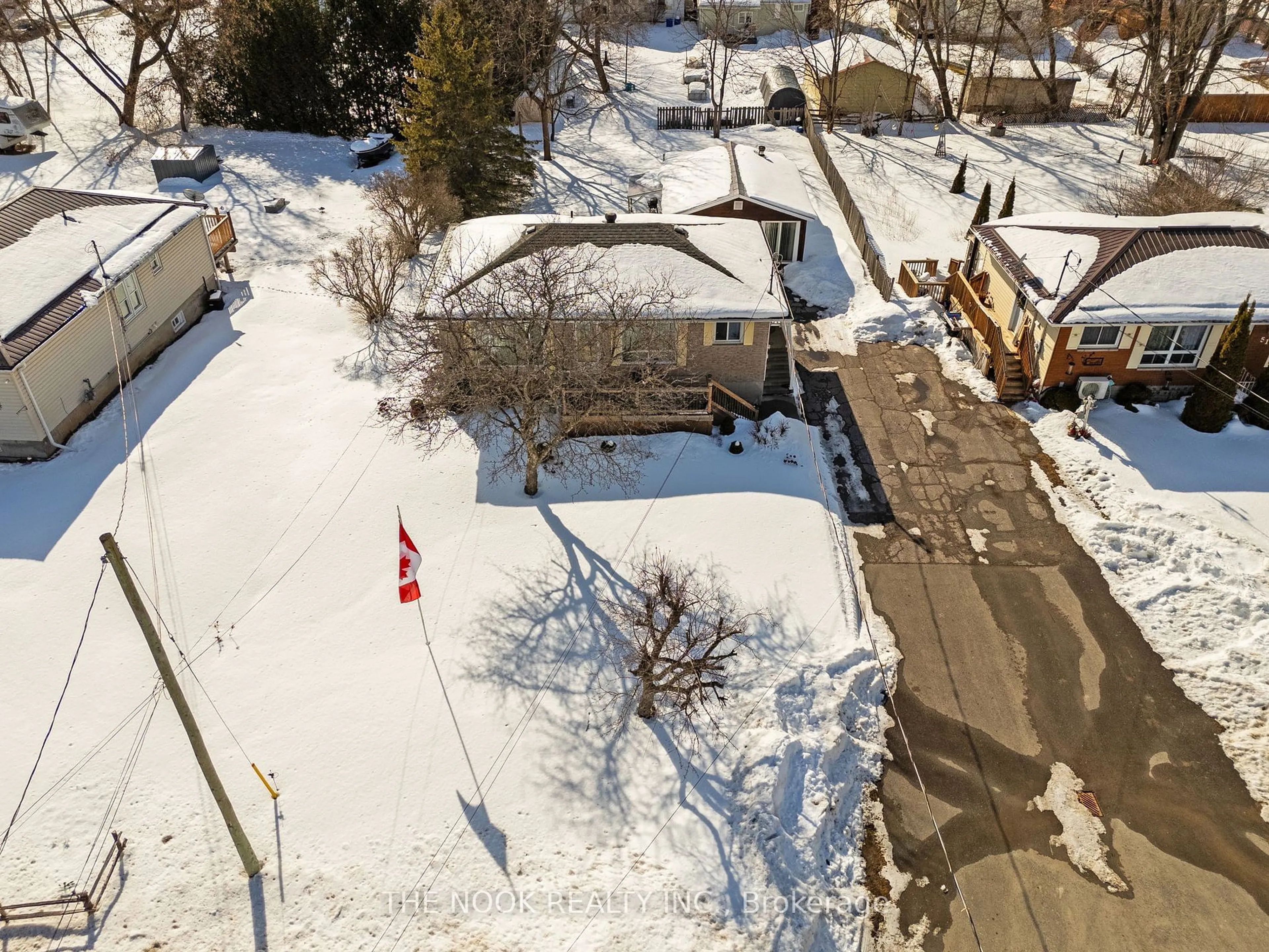 A pic from outside/outdoor area/front of a property/back of a property/a pic from drone, street for 53 Bursthall St, Marmora and Lake Ontario K0K 2M0