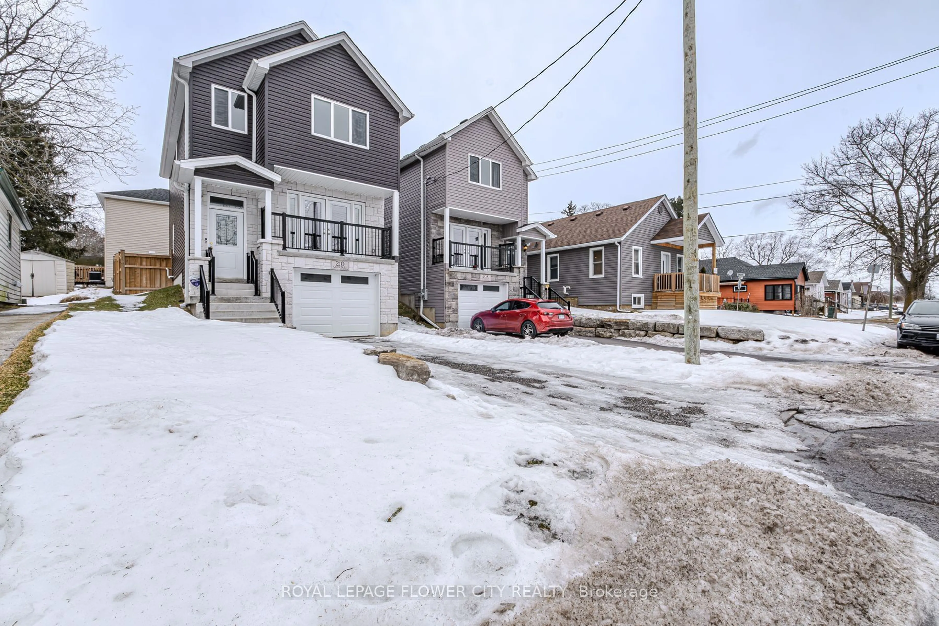 A pic from outside/outdoor area/front of a property/back of a property/a pic from drone, street for 210 Queen St, Norfolk Ontario N3Y 3C8