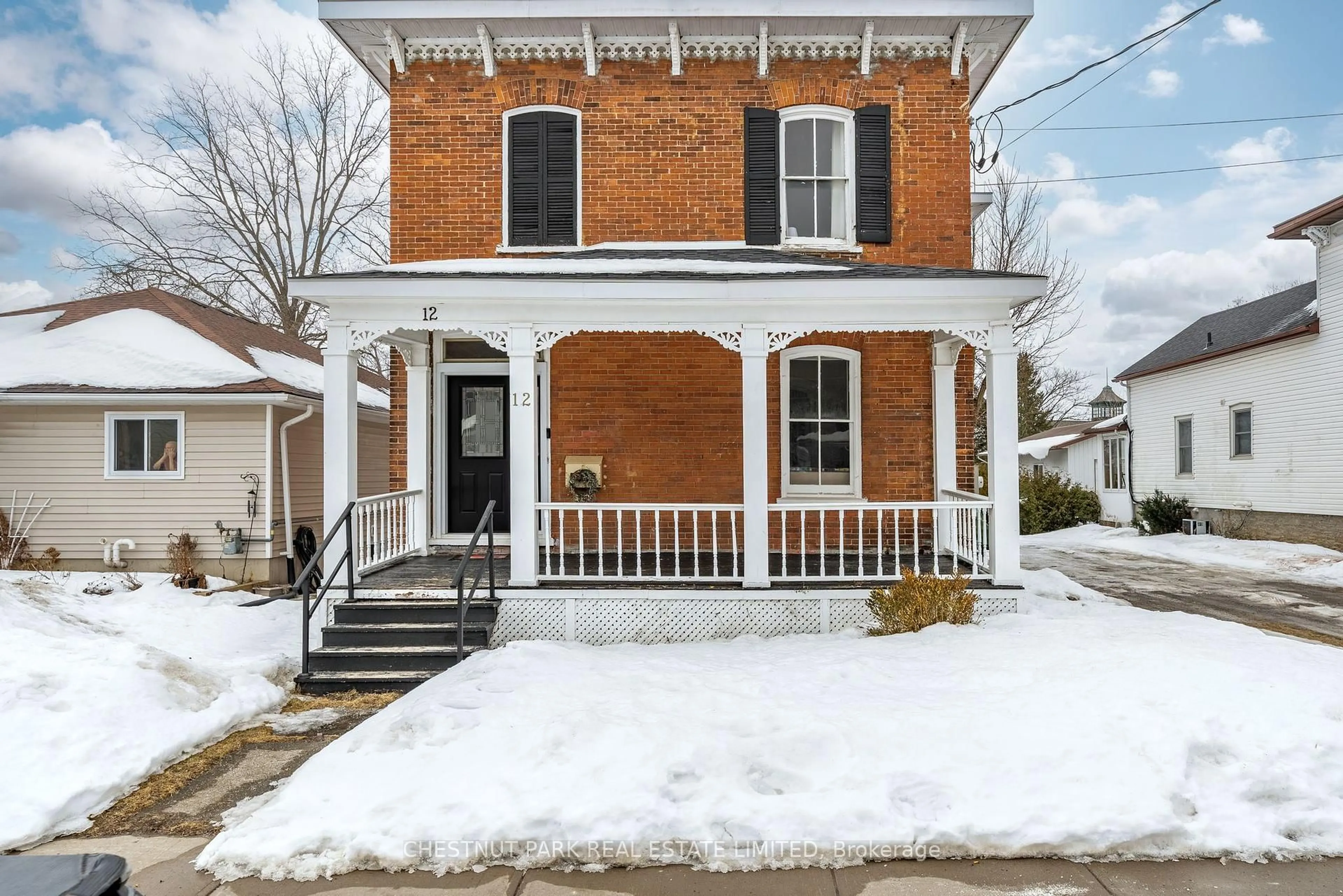 Home with brick exterior material, street for 12 Maple Ave, Prince Edward County Ontario K0K 2T0