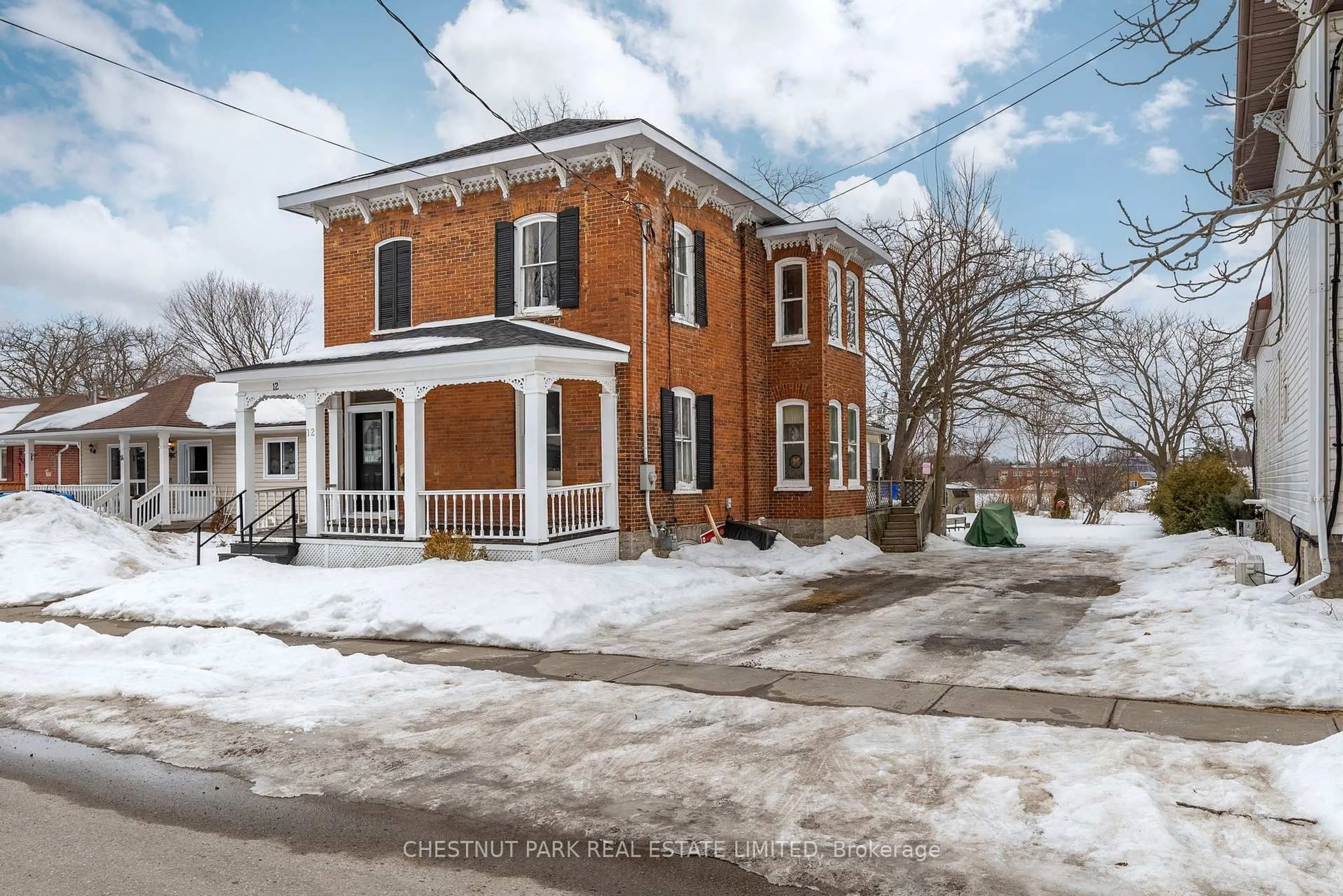 Home with brick exterior material, street for 12 Maple Ave, Prince Edward County Ontario K0K 2T0