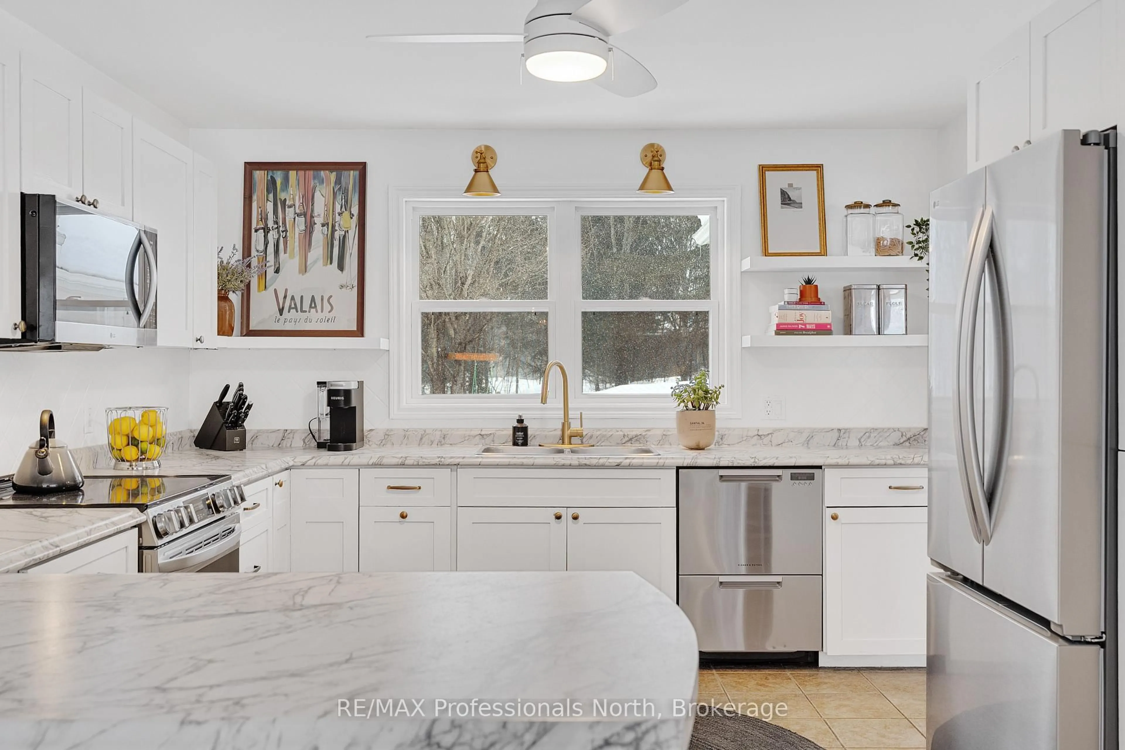 Open concept kitchen, ceramic/tile floor for 47 Farmcrest Ave, Dysart et al Ontario K0M 1S0