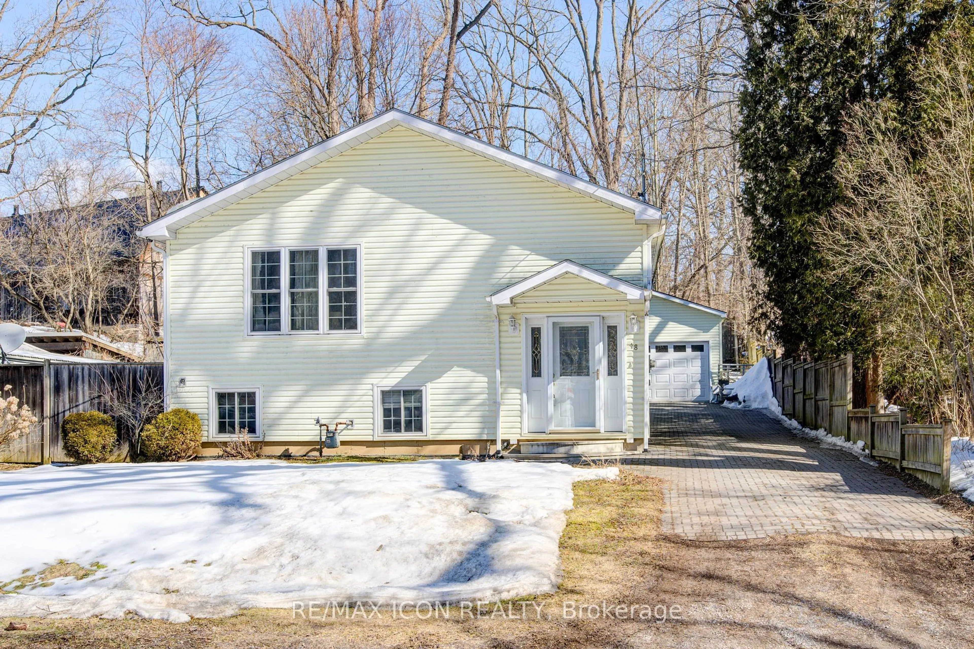 Home with vinyl exterior material, street for 18 Commercial Rd, Norfolk Ontario N3Y 4K2