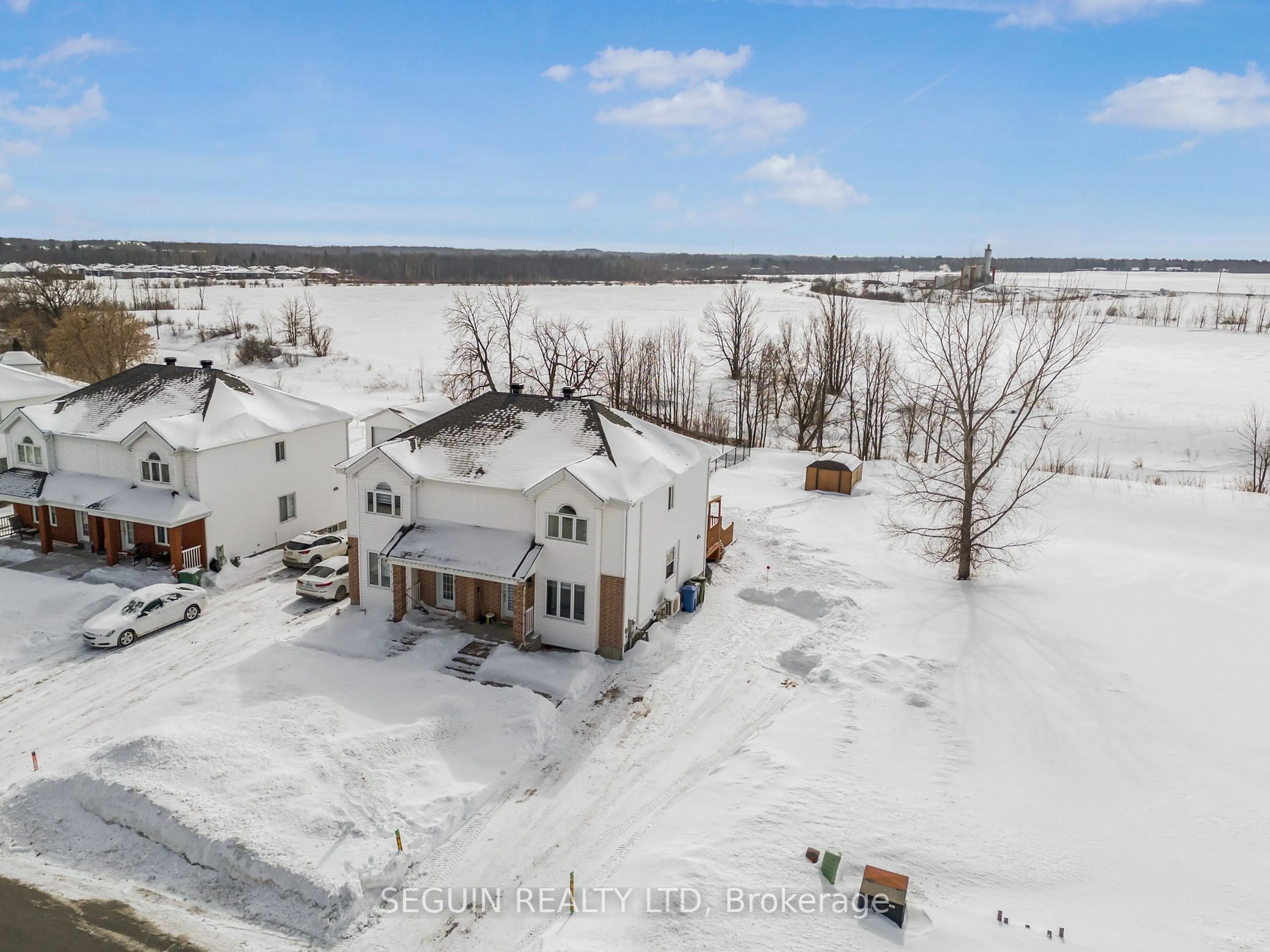 A pic from outside/outdoor area/front of a property/back of a property/a pic from drone, water/lake/river/ocean view for 922 Roch St, Hawkesbury Ontario K6A 3V3