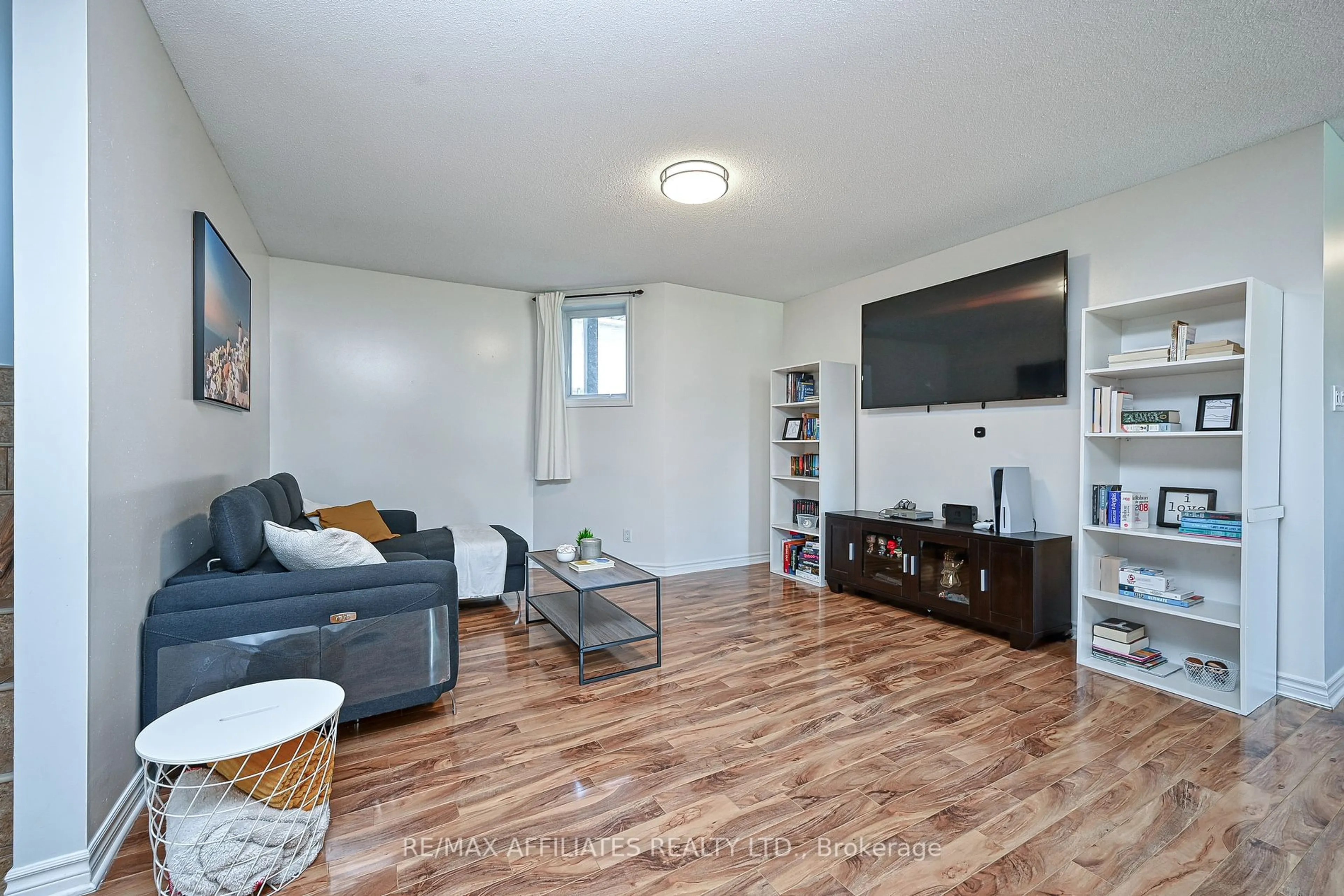 Living room with furniture, wood/laminate floor for 39 MAIN St #8, The Nation Ontario K0A 2M0