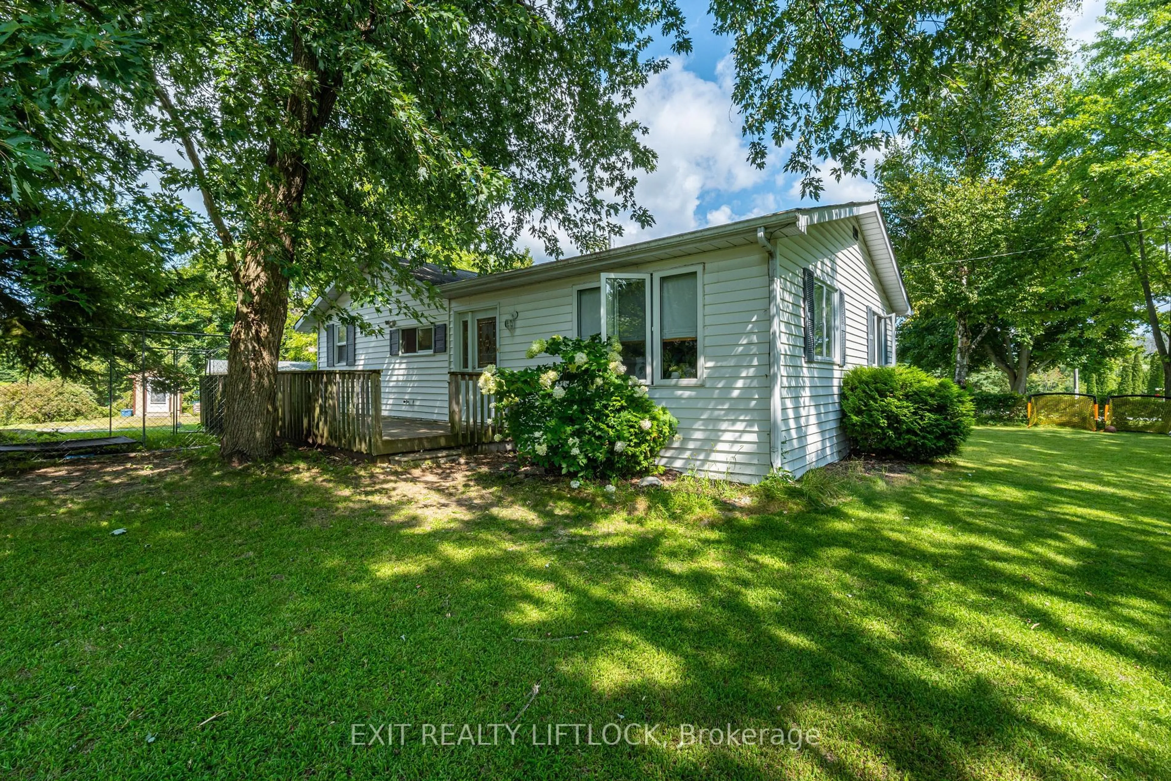 A pic from outside/outdoor area/front of a property/back of a property/a pic from drone, street for 6 Woods Ave, Kawartha Lakes Ontario K0L 2W0
