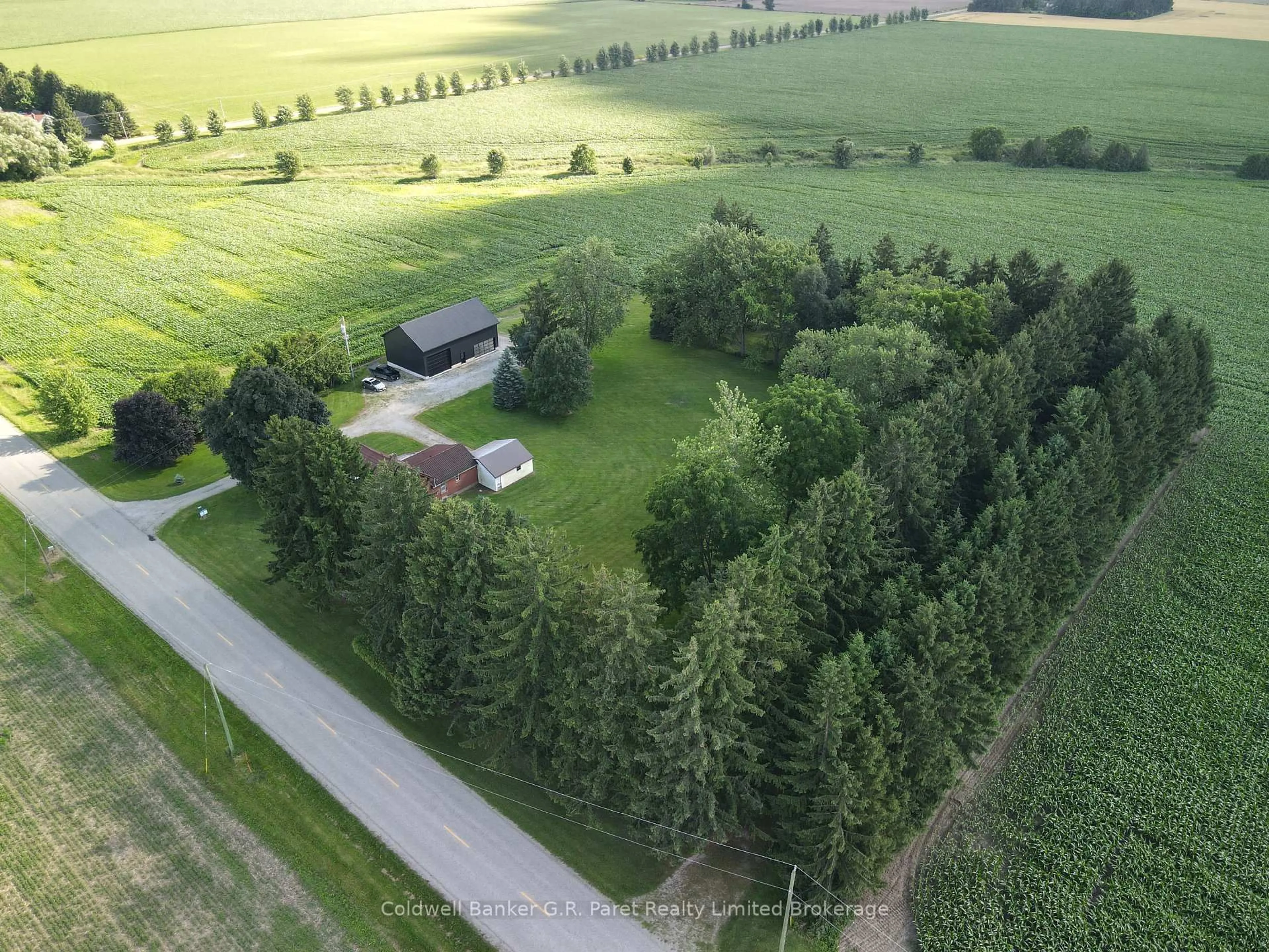 A pic from outside/outdoor area/front of a property/back of a property/a pic from drone, forest/trees view for 22445 Fairview Rd, Thames Centre Ontario N0M 2P0