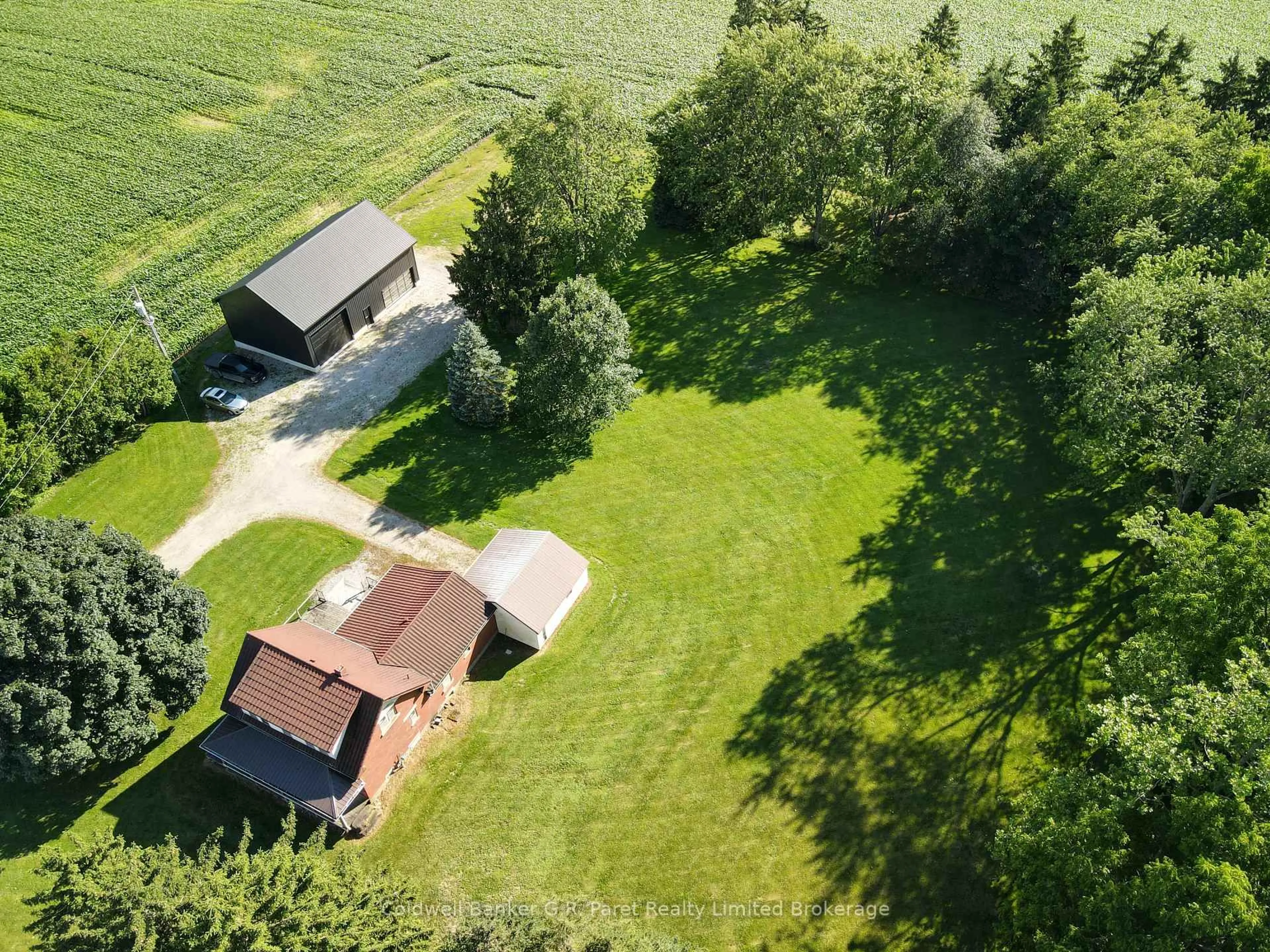 A pic from outside/outdoor area/front of a property/back of a property/a pic from drone, forest/trees view for 22445 Fairview Rd, Thames Centre Ontario N0M 2P0