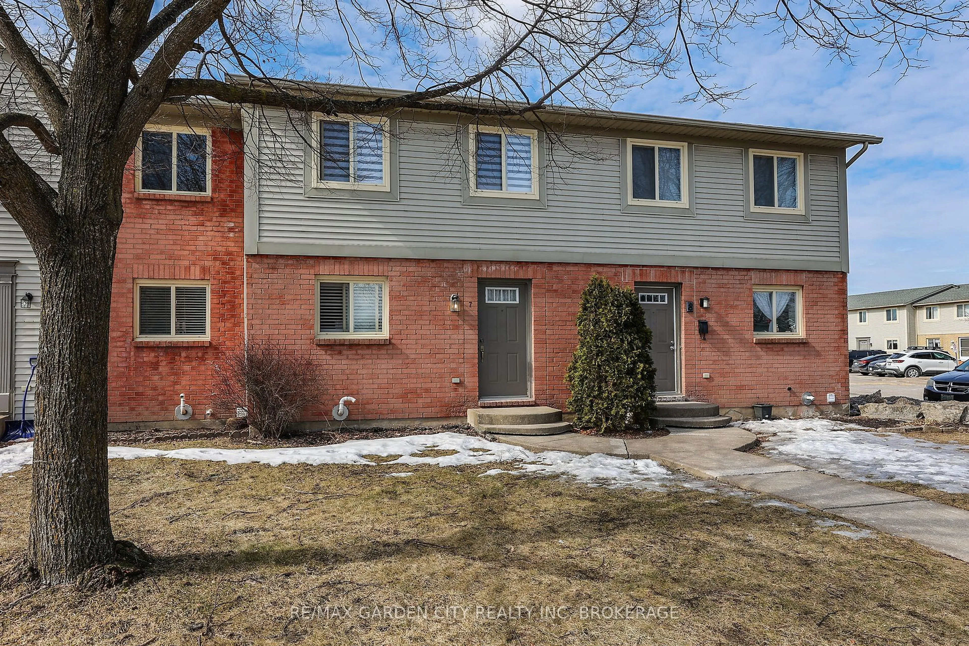 Home with brick exterior material, street for 65 Dorchester Blvd #7, St. Catharines Ontario L2M 7S9