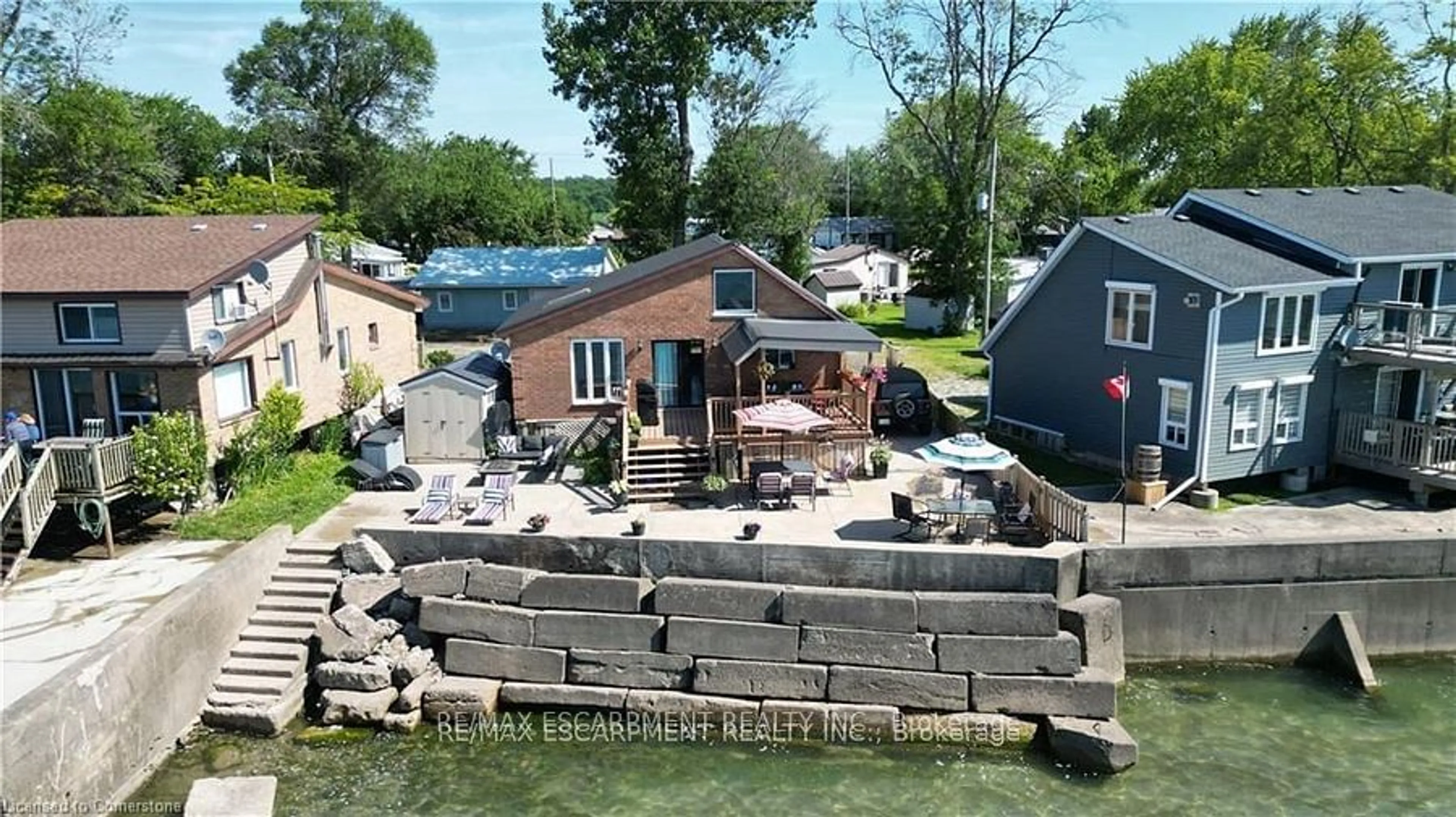 A pic from outside/outdoor area/front of a property/back of a property/a pic from drone, water/lake/river/ocean view for 22 Winger Bay Lane, Haldimand Ontario N0A 1P0