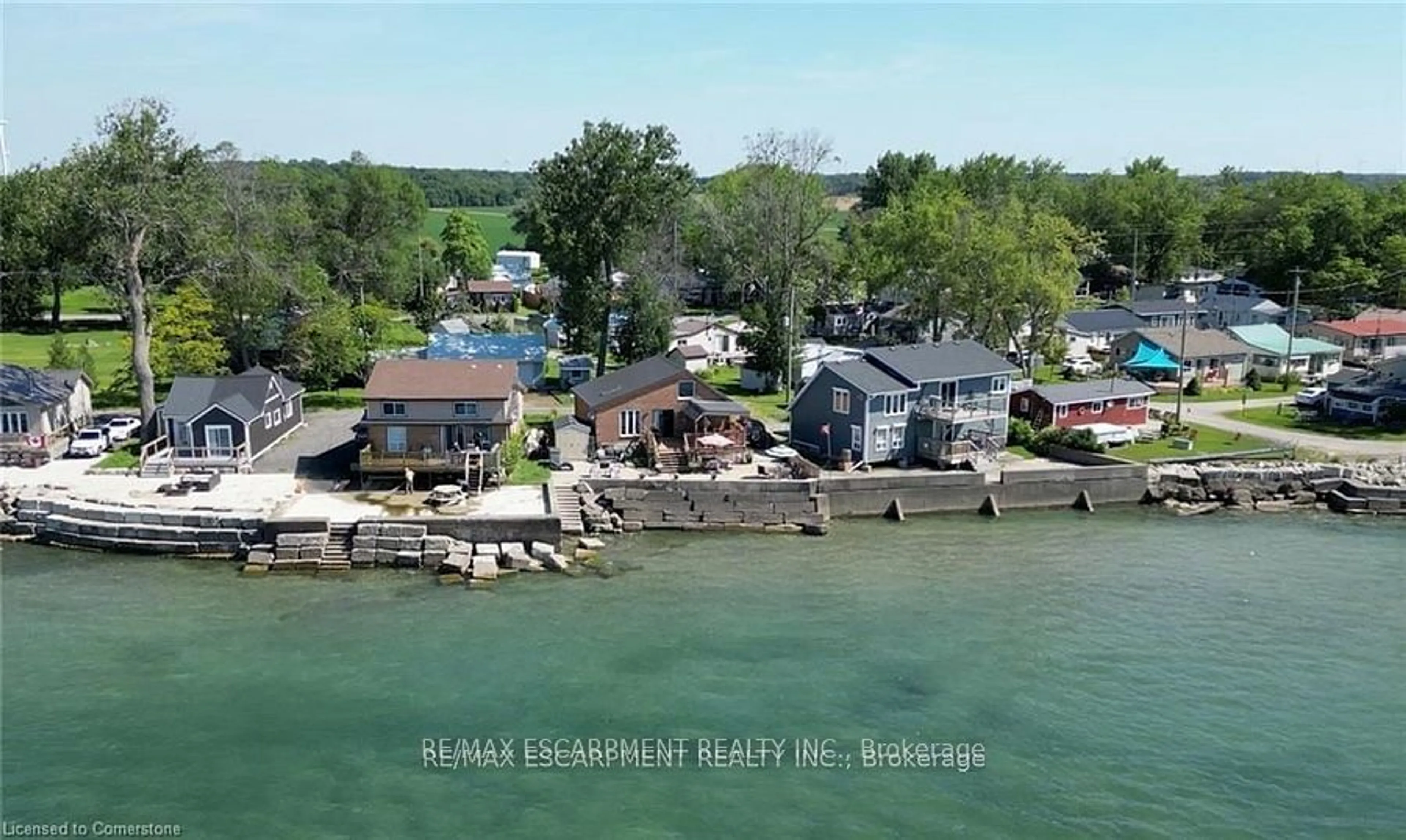 A pic from outside/outdoor area/front of a property/back of a property/a pic from drone, water/lake/river/ocean view for 22 Winger Bay Lane, Haldimand Ontario N0A 1P0