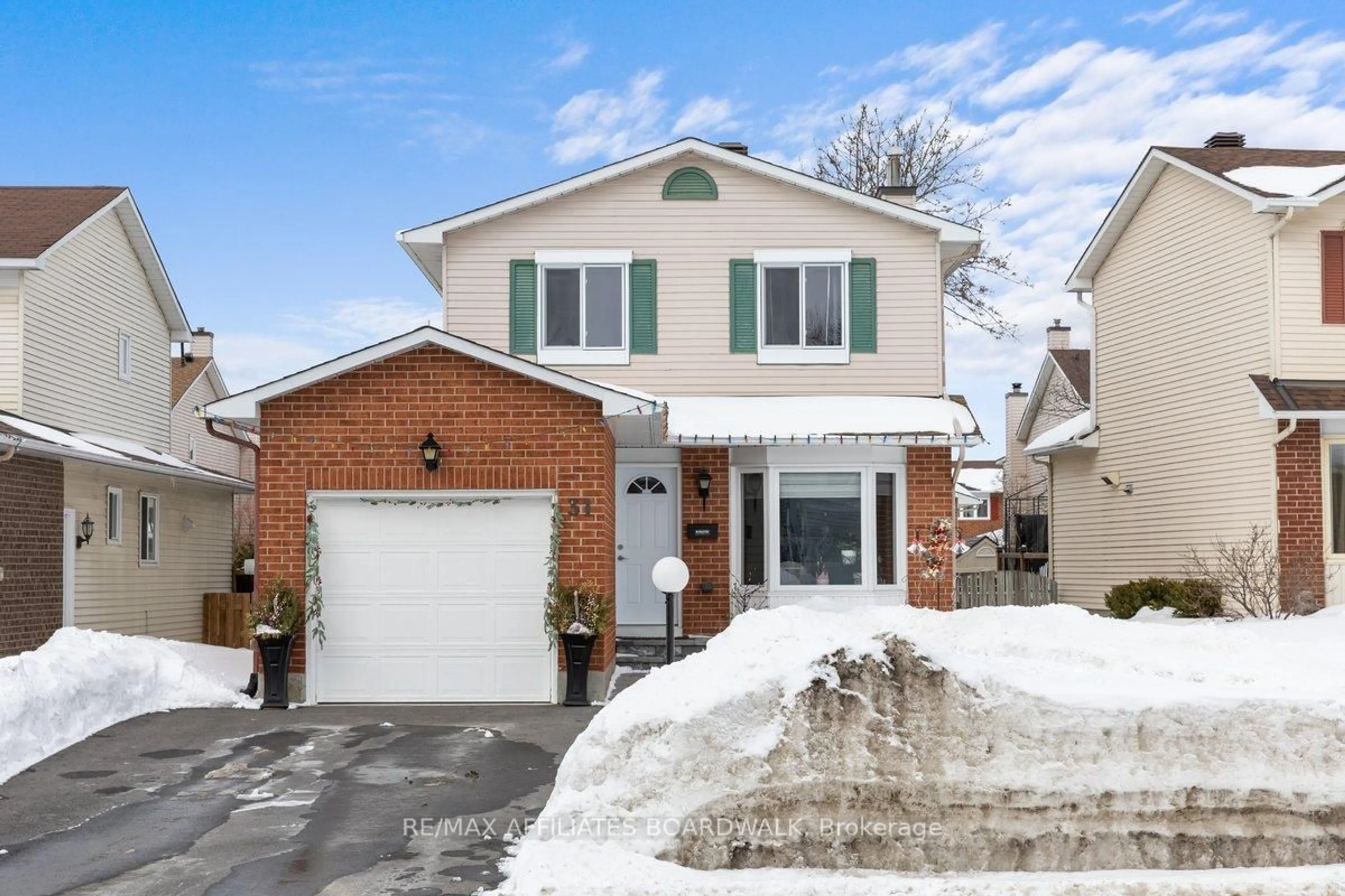 Home with brick exterior material, street for 31 Palomino Dr, Kanata Ontario K2M 1M2