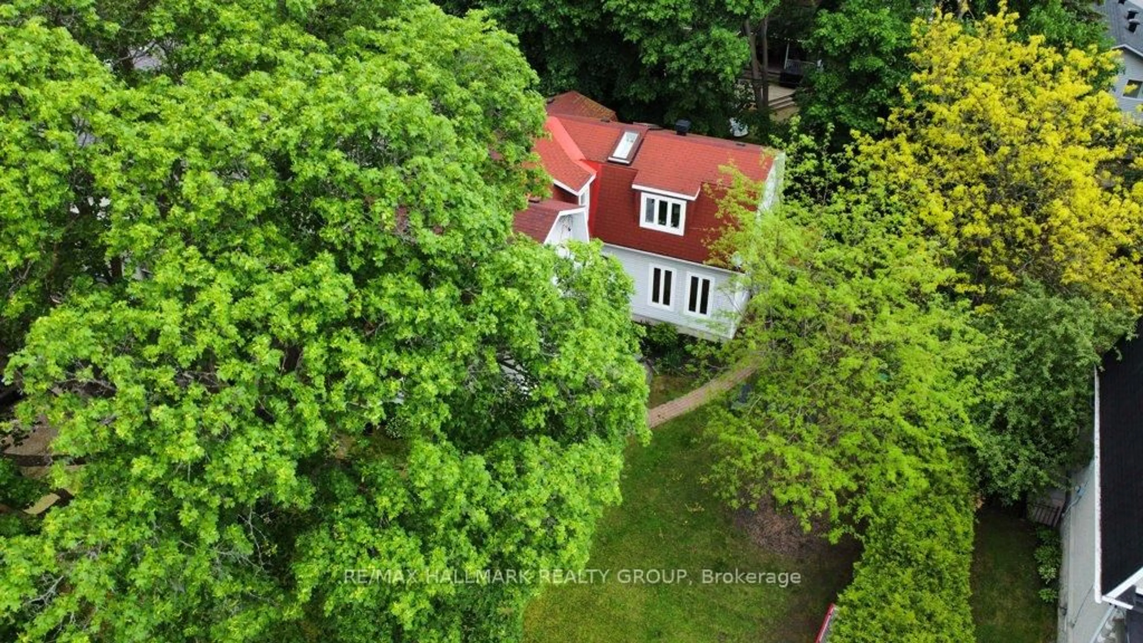 A pic from outside/outdoor area/front of a property/back of a property/a pic from drone, forest/trees view for 561 Edison Ave, Carlingwood - Westboro and Area Ontario K2A 1V5