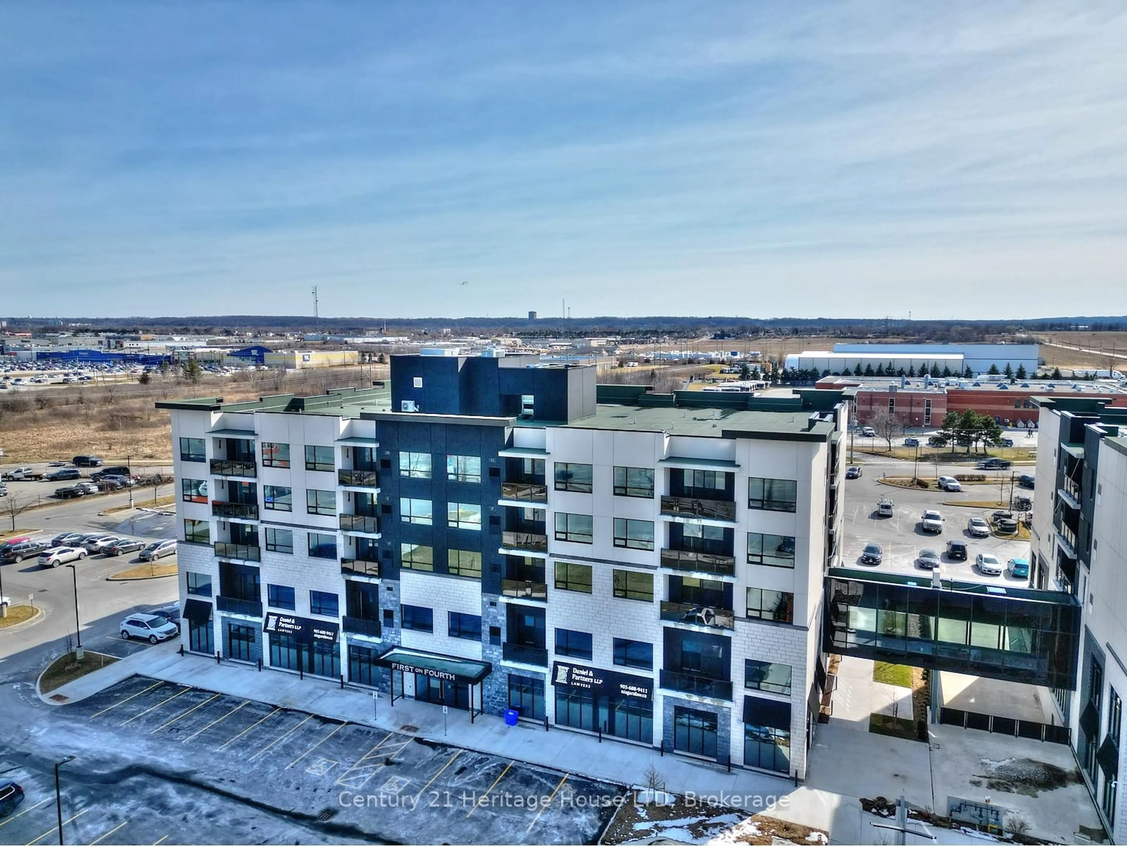 A pic from outside/outdoor area/front of a property/back of a property/a pic from drone, city buildings view from balcony for 300B FOURTH Ave #203, St. Catharines Ontario L2S 0E6