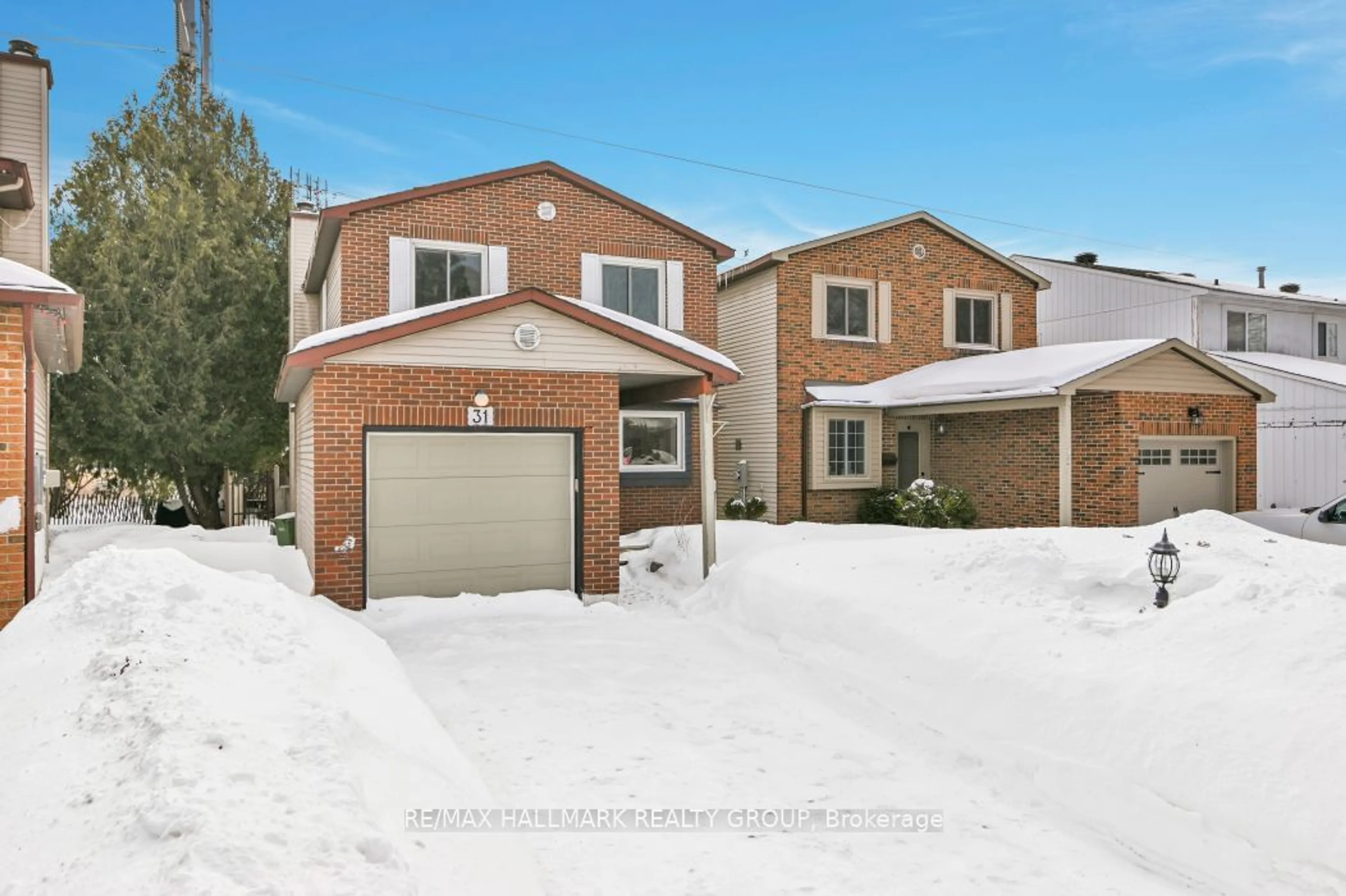 Home with brick exterior material, street for 31 Stable Way, Kanata Ontario K2M 1A8