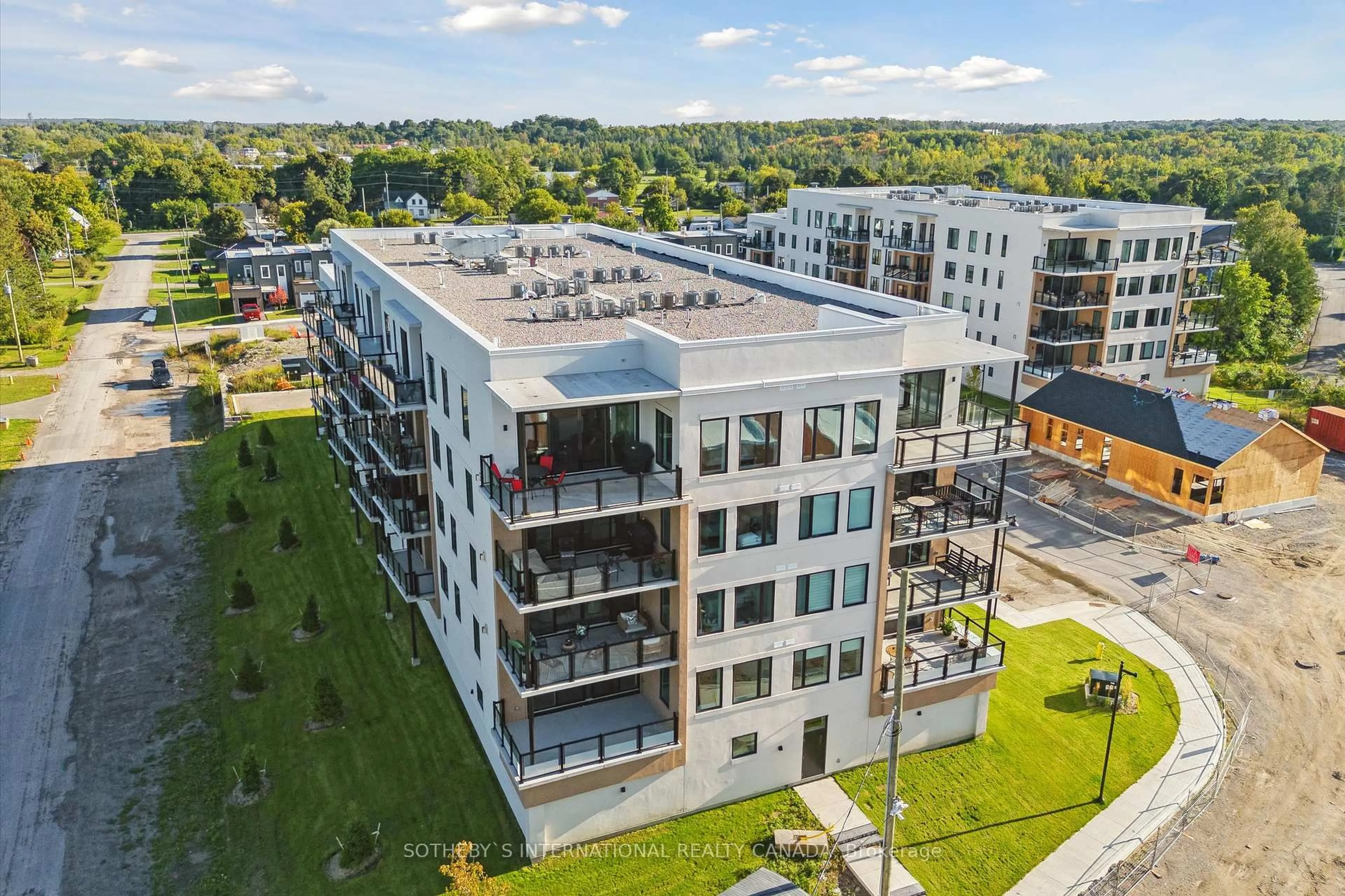 A pic from outside/outdoor area/front of a property/back of a property/a pic from drone, city buildings view from balcony for 19B West St #208, Kawartha Lakes Ontario K0M 1N0