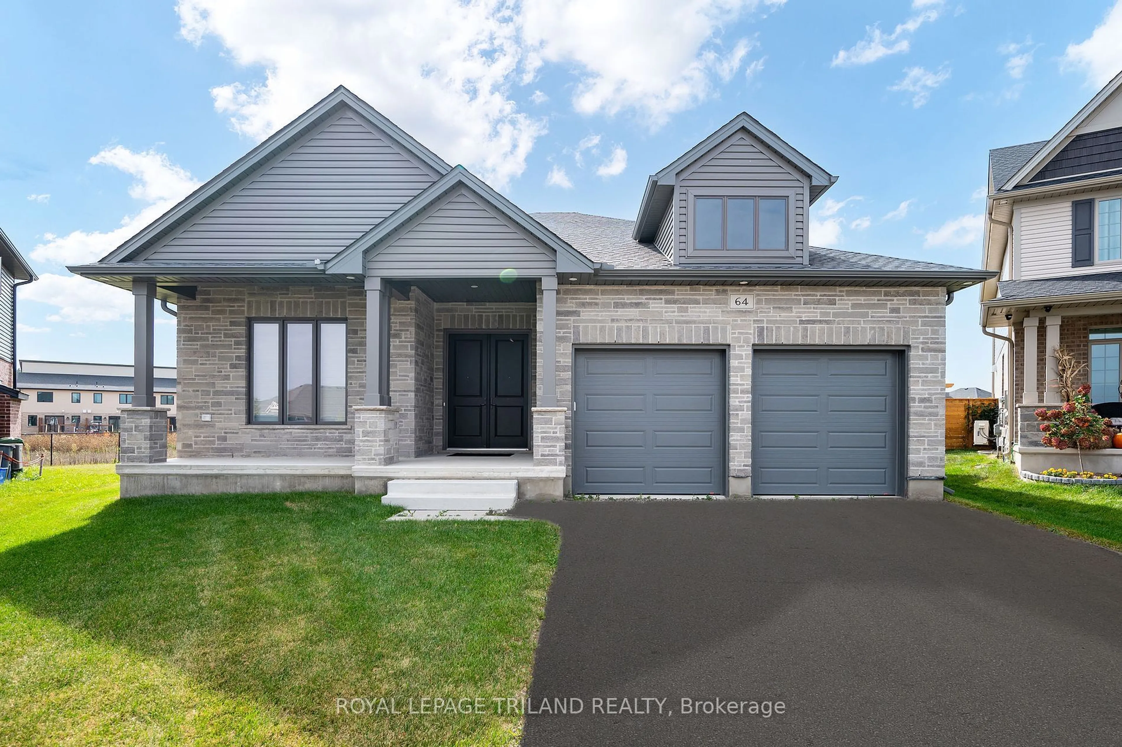 Home with brick exterior material, street for 64 Acorn Tr, St. Thomas Ontario N5R 0H8