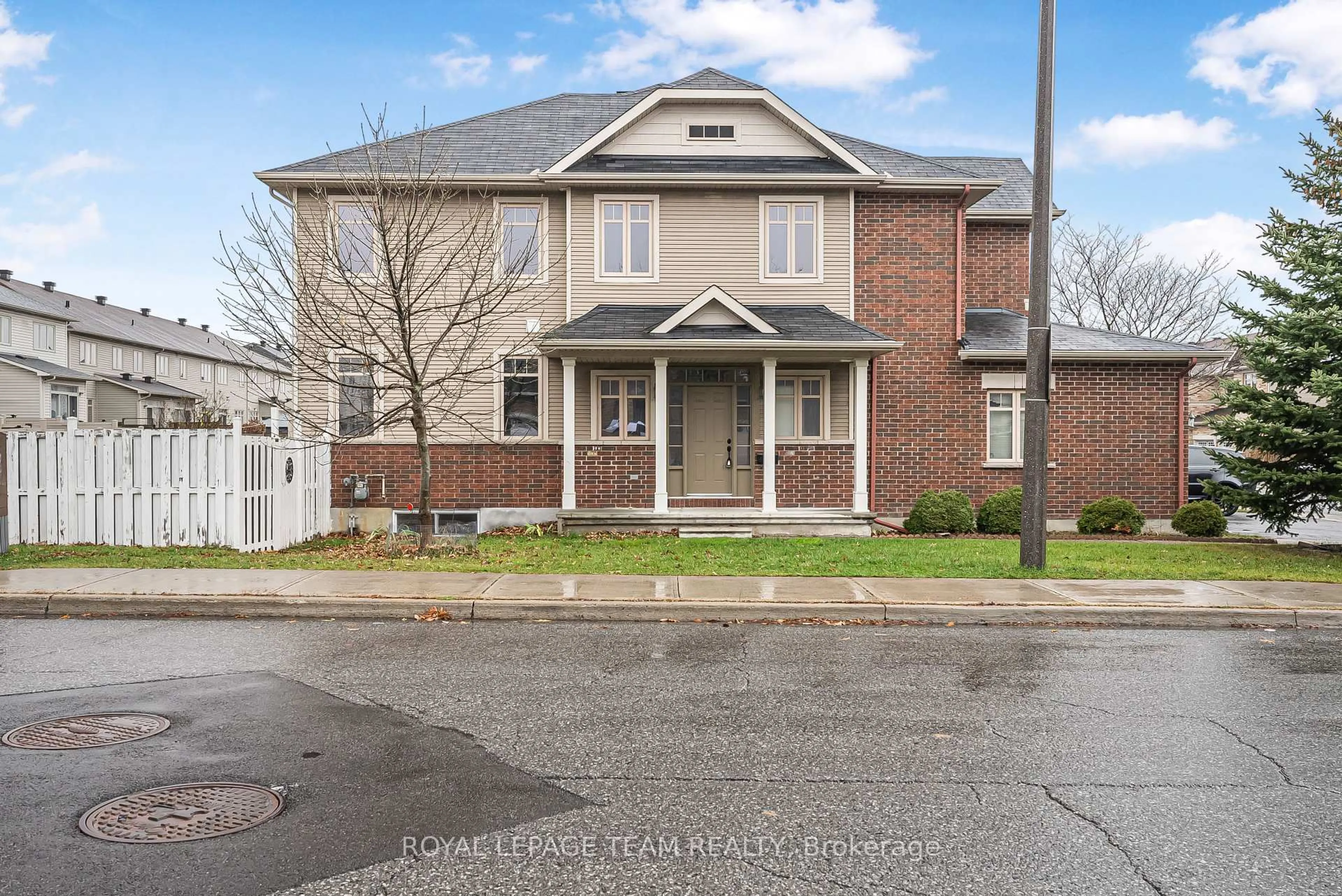 Home with brick exterior material, street for 74 MADELON Dr, Barrhaven Ontario K2J 5C5