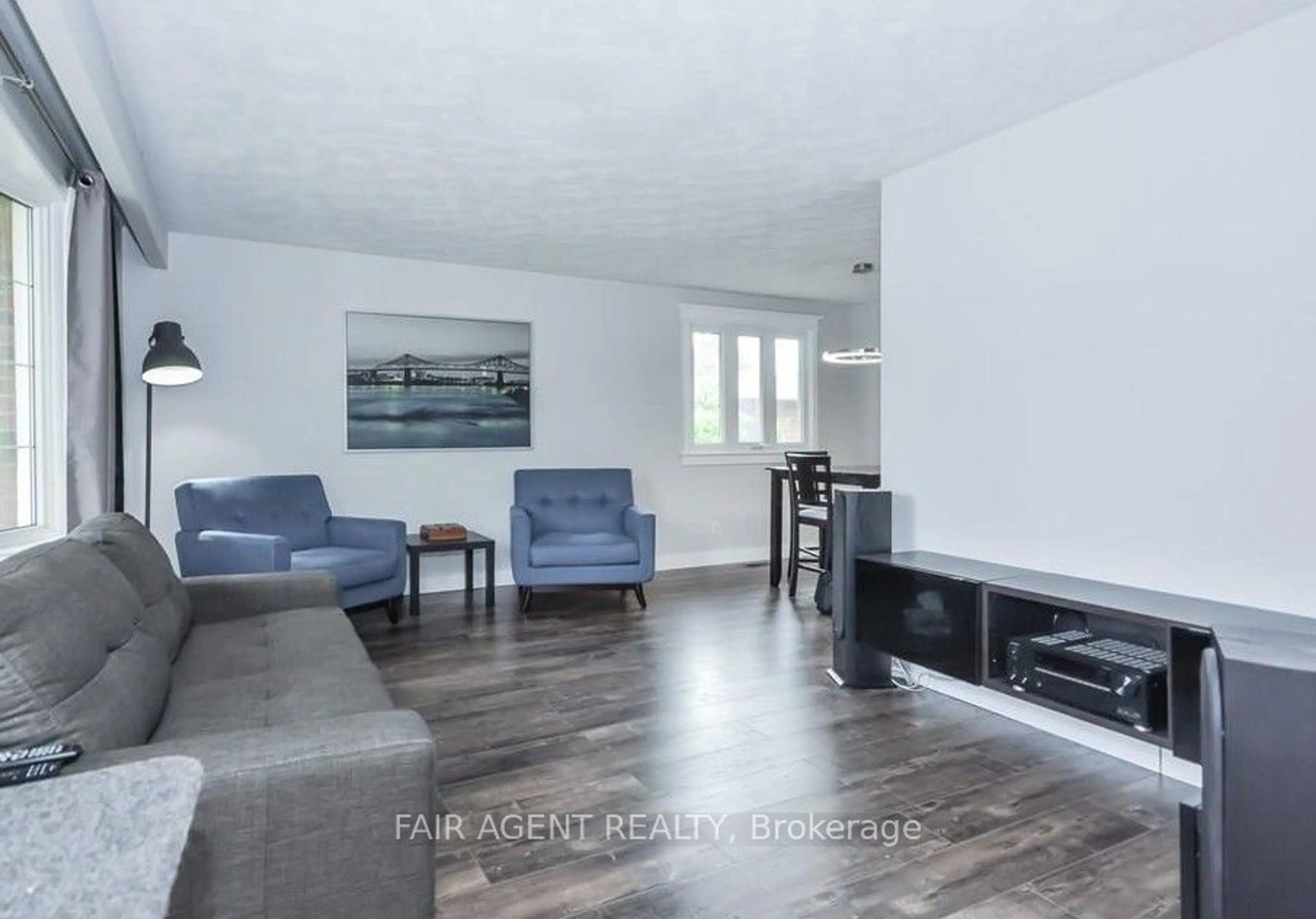 Living room with furniture, wood/laminate floor for 6 LAMBERT Cres, Guelph Ontario N1G 2R5