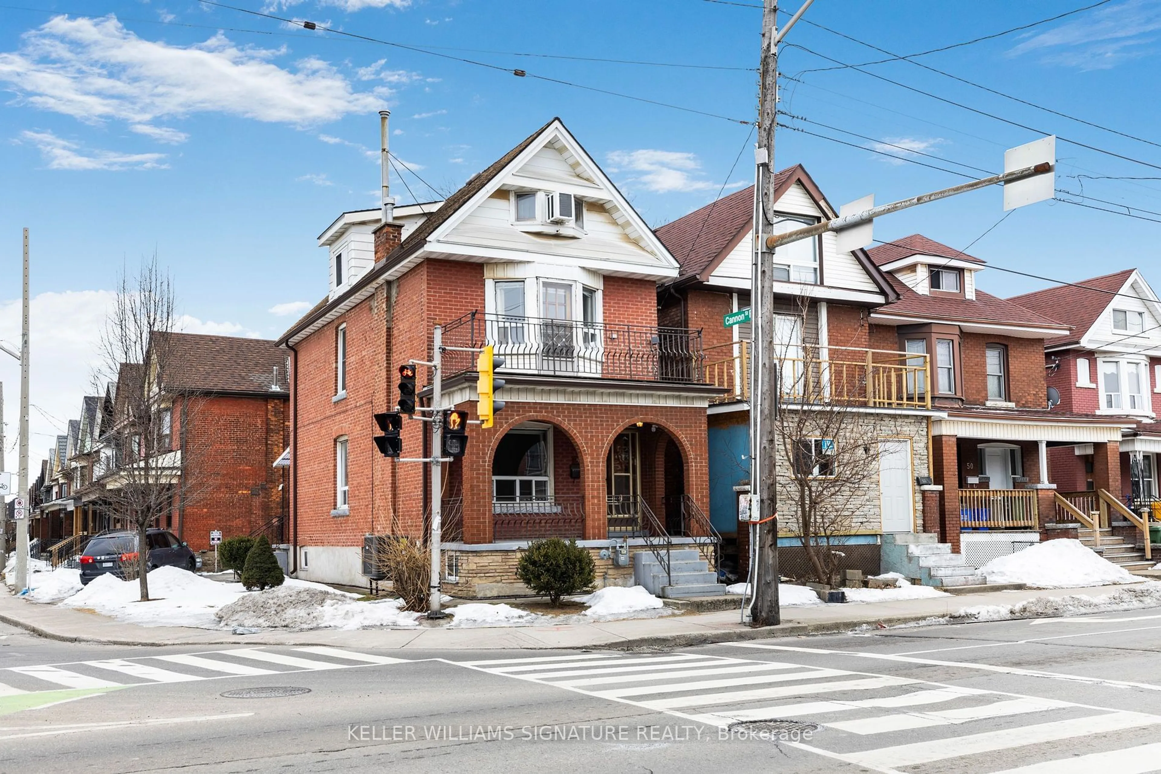 Home with brick exterior material, street for 54 Sherman Ave, Hamilton Ontario L8L 6L8