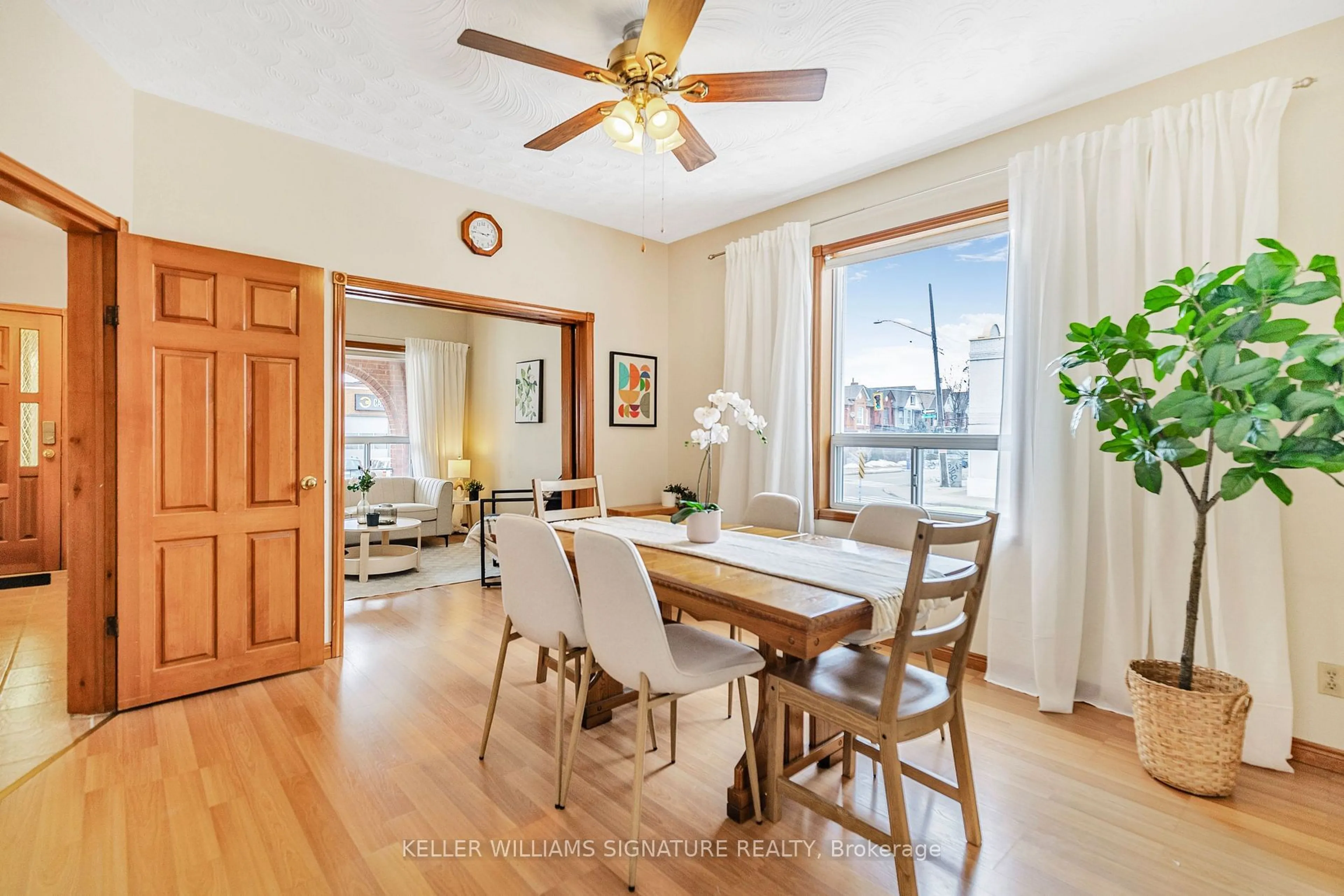 Dining room, wood/laminate floor for 54 Sherman Ave, Hamilton Ontario L8L 6L8