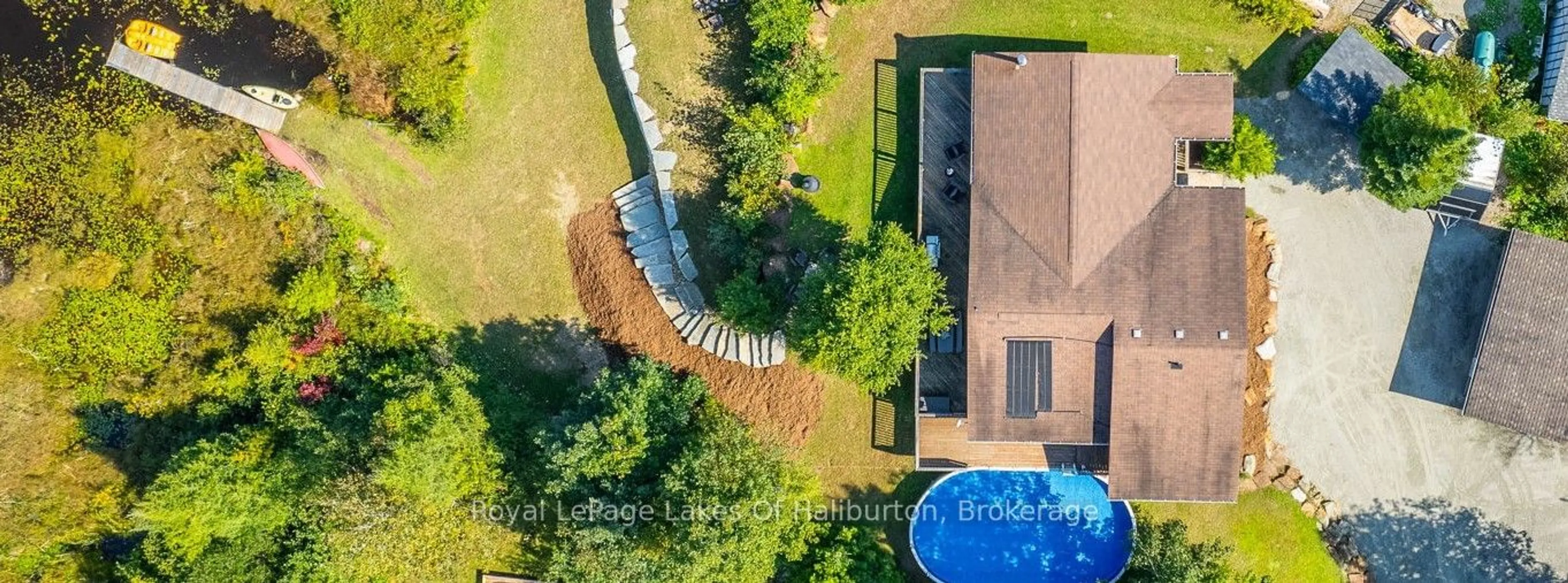 A pic from outside/outdoor area/front of a property/back of a property/a pic from drone, water/lake/river/ocean view for 2825 IB&O Rail Tr, Highlands East Ontario K0L 2Y0