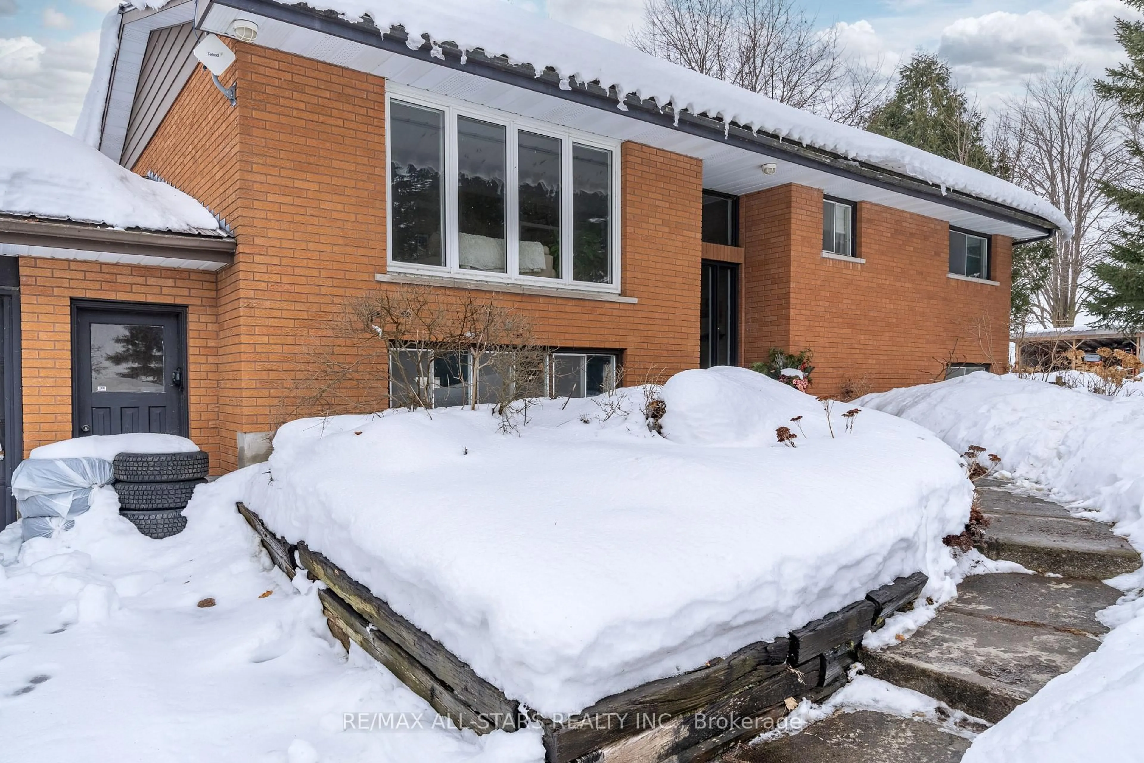 Home with brick exterior material, street for 68 Black School Rd, Kawartha Lakes Ontario K0M 2T0