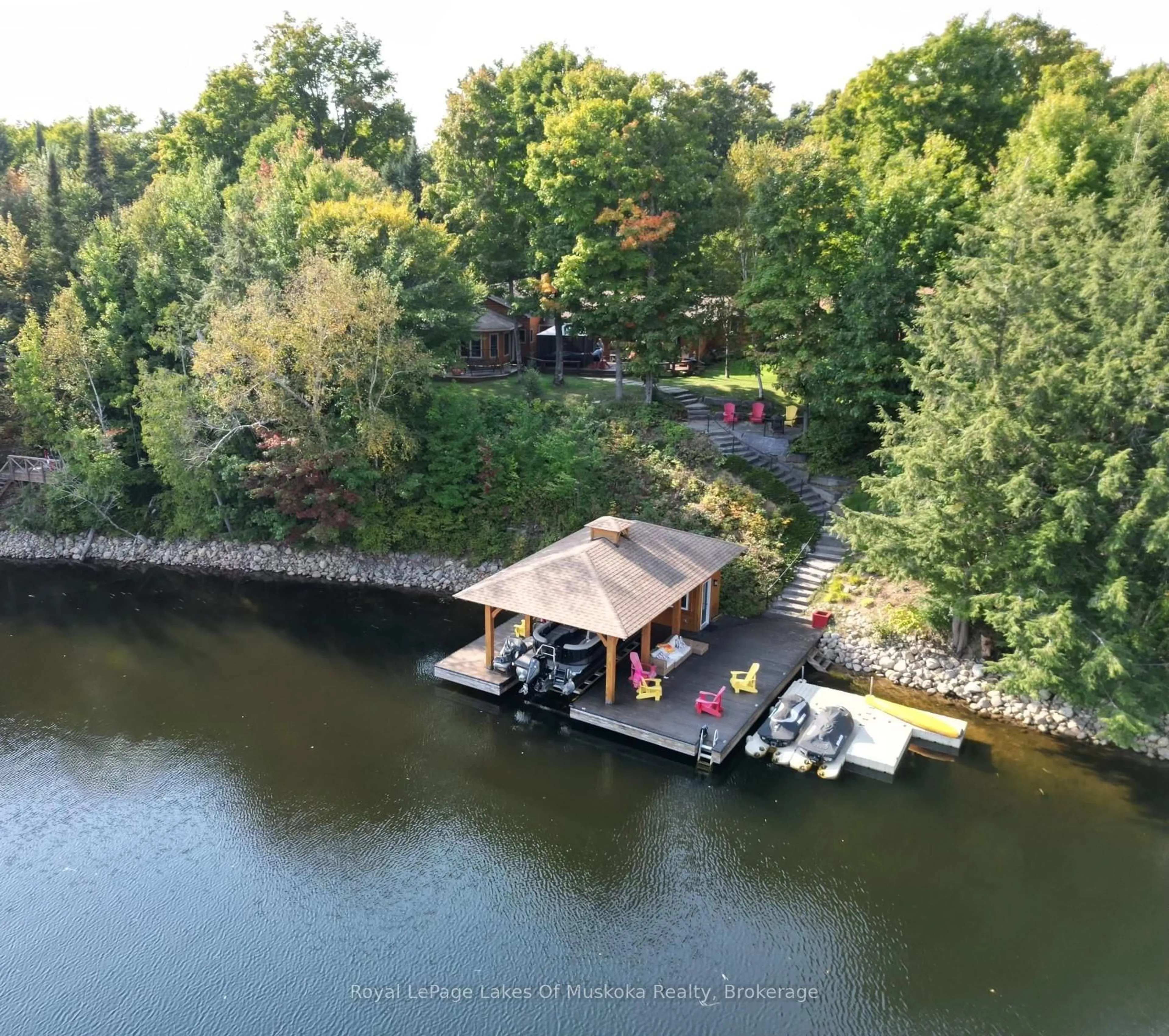 A pic from outside/outdoor area/front of a property/back of a property/a pic from drone, water/lake/river/ocean view for 1319 Wolf Circ, Algonquin Highlands Ontario P0A 1E0