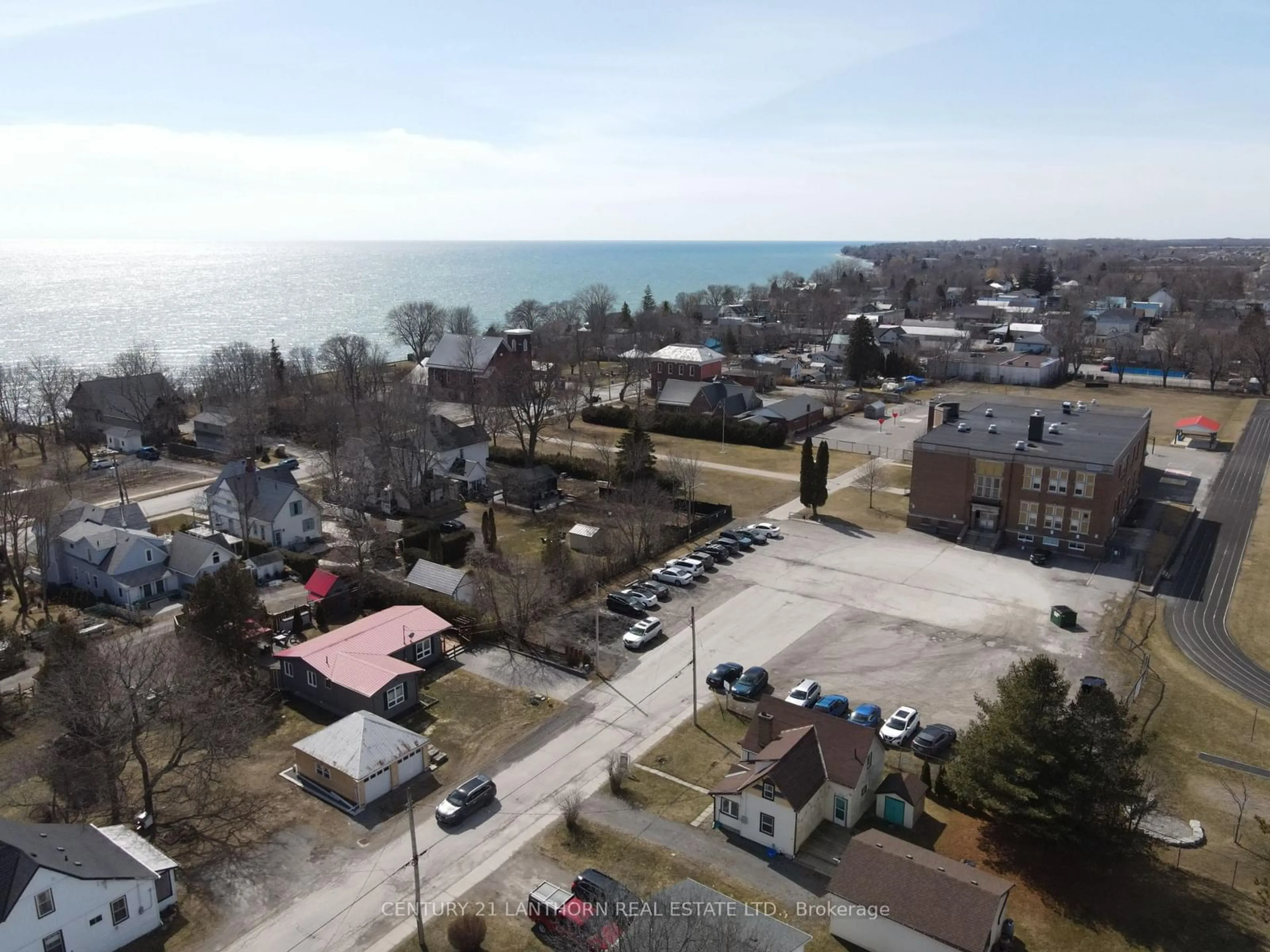 A pic from outside/outdoor area/front of a property/back of a property/a pic from drone, water/lake/river/ocean view for 231 Oak St, Prince Edward County Ontario K0K 3L0