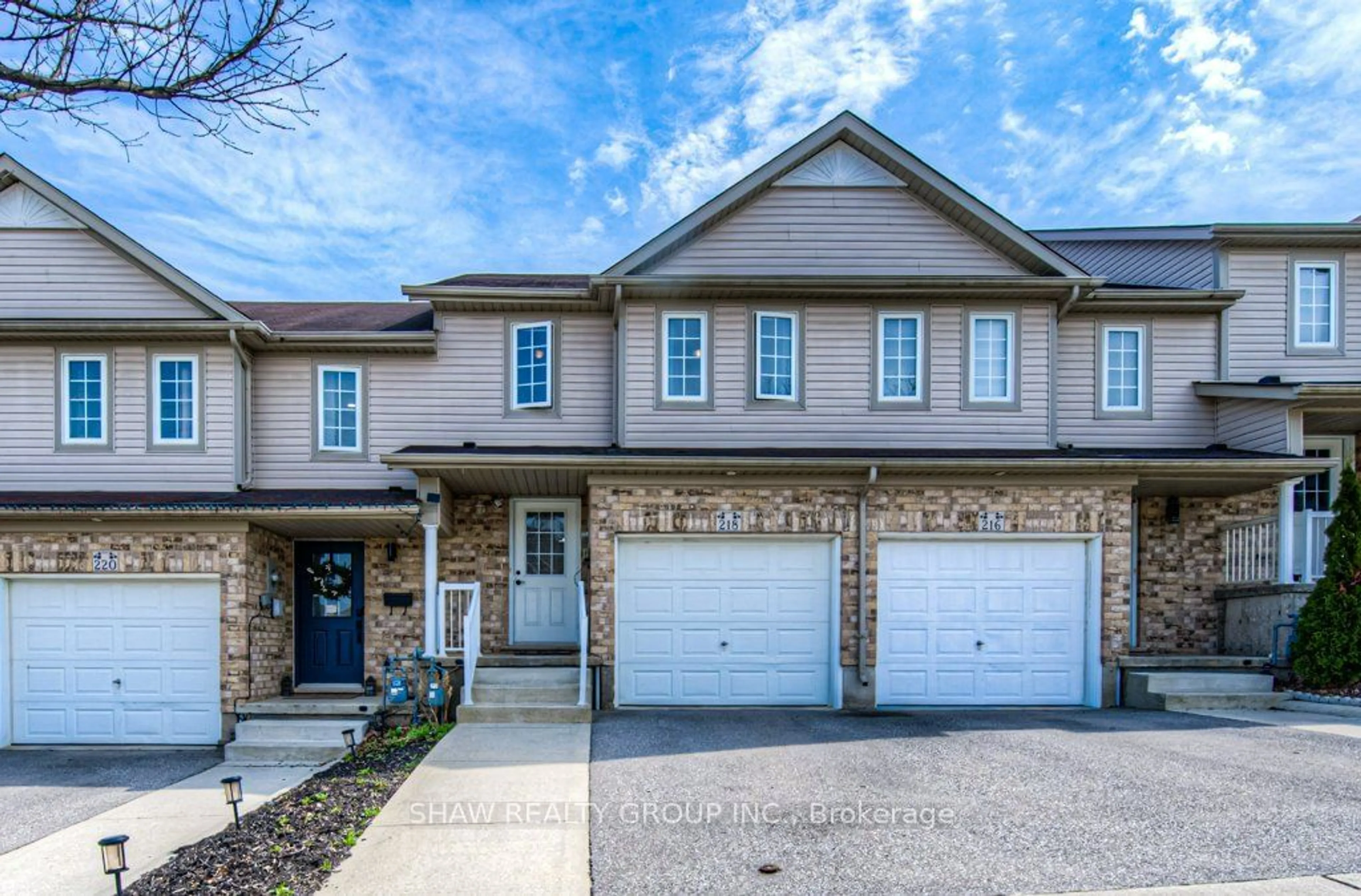 Home with brick exterior material, street for 218 Red Clover Crt, Kitchener Ontario N2E 4J5