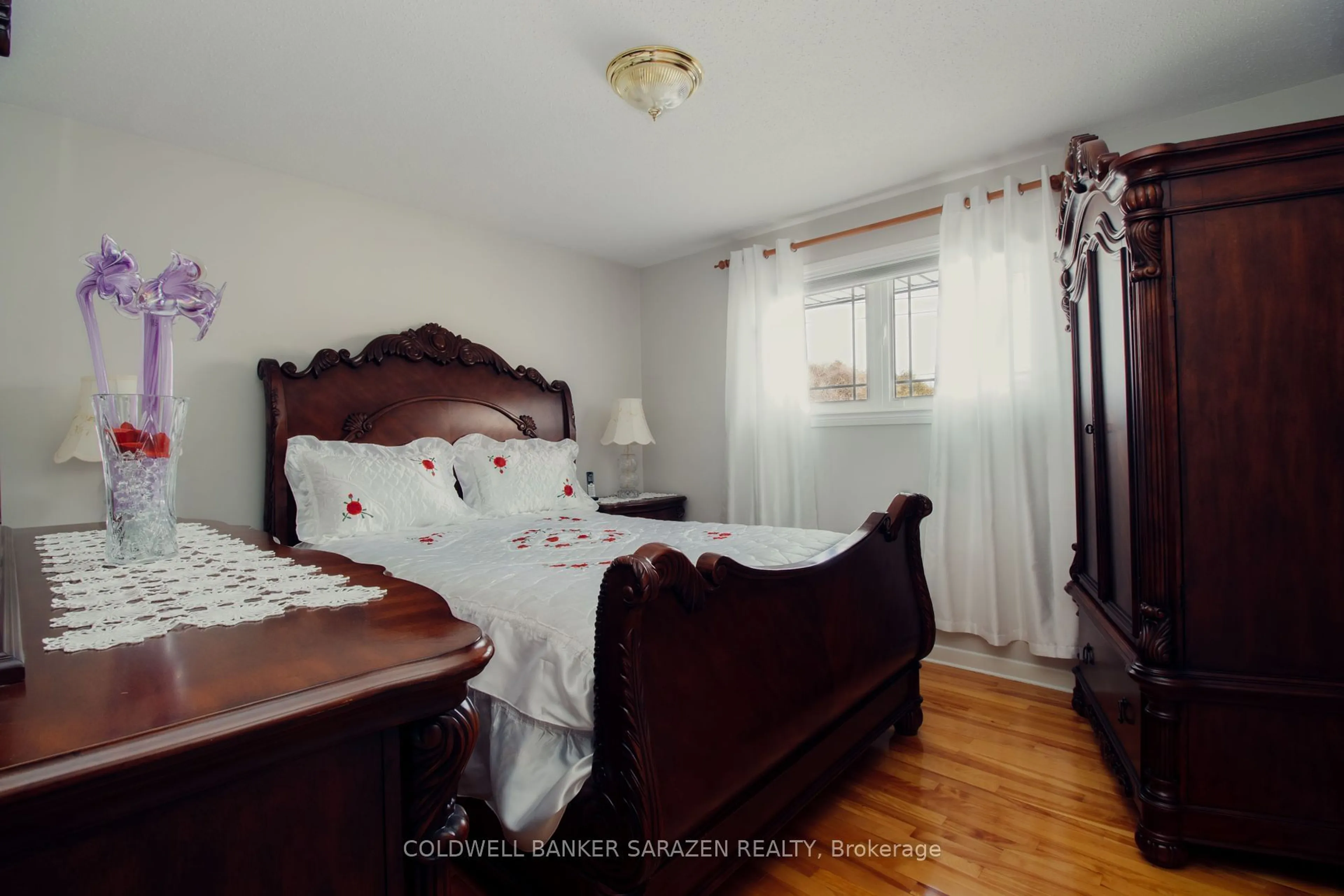 Bedroom with bed, wood/laminate floor for 2435 Heaton Ave, Ottawa Ontario K1G 1J1