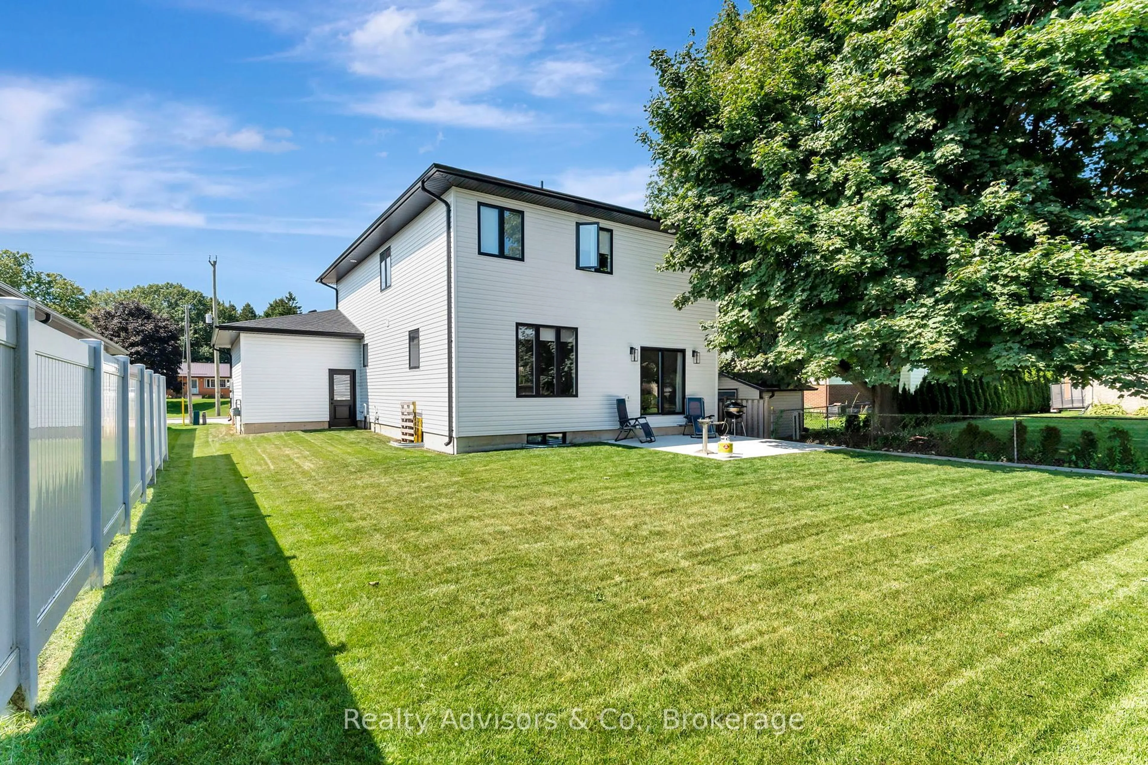 A pic from outside/outdoor area/front of a property/back of a property/a pic from drone, street for 154930 15th Line, Zorra Ontario N5C 3J6