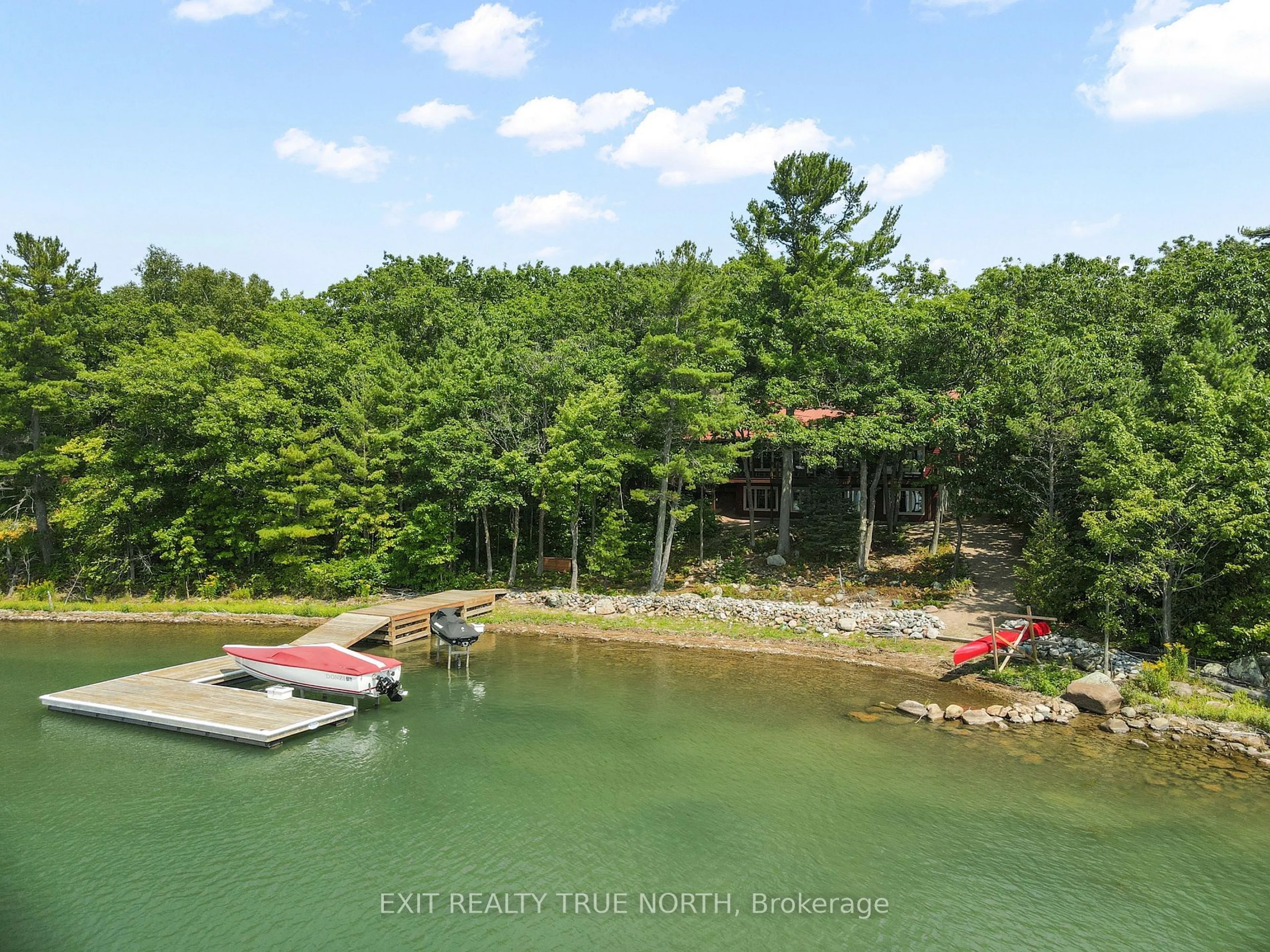 A pic from outside/outdoor area/front of a property/back of a property/a pic from drone, water/lake/river/ocean view for 687 Finns Bay Rd, Laird Ontario P0S 1C0