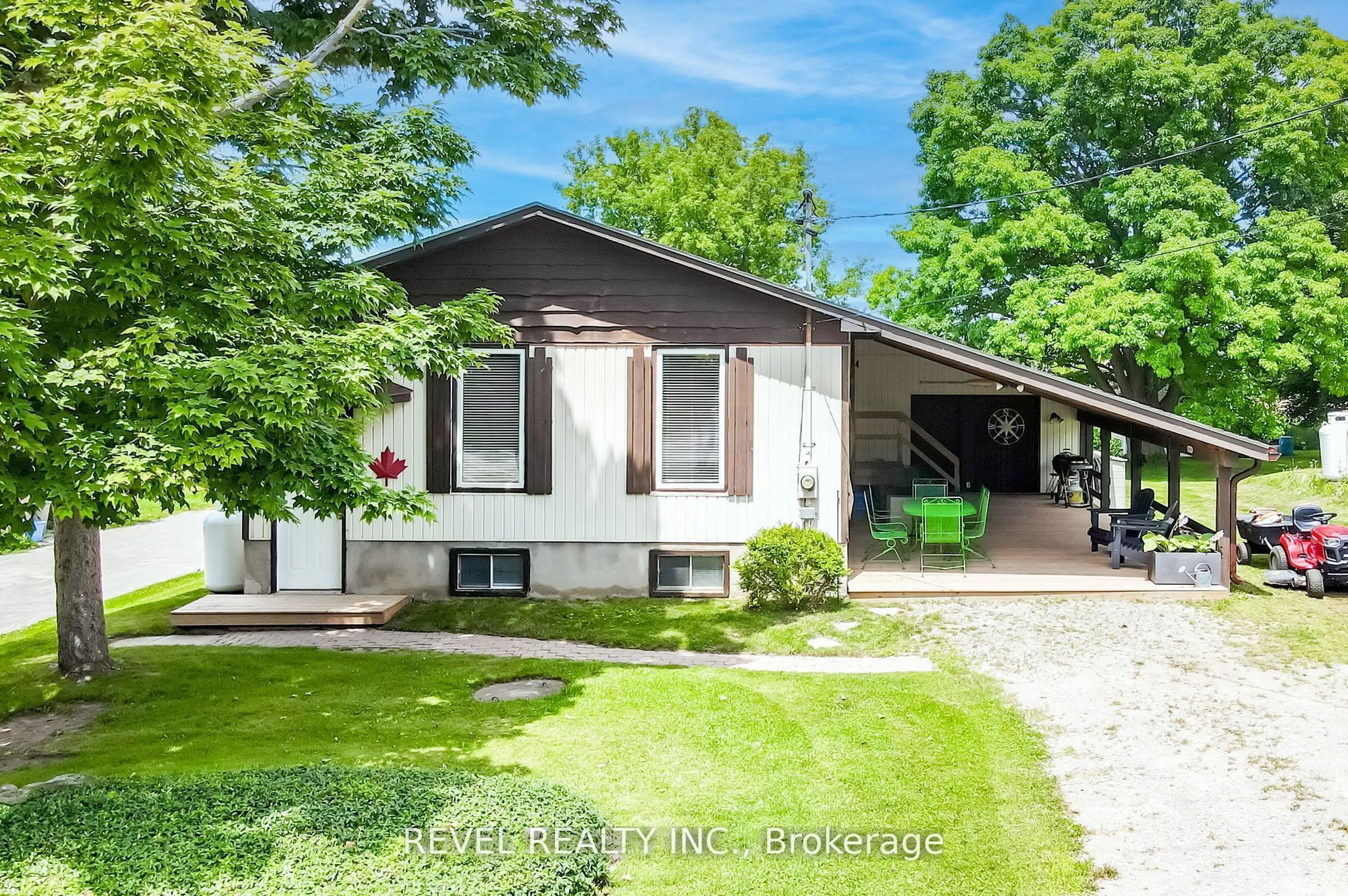 Home with vinyl exterior material, street for 119 Elm Tree Rd, Kawartha Lakes Ontario K0M 2C0