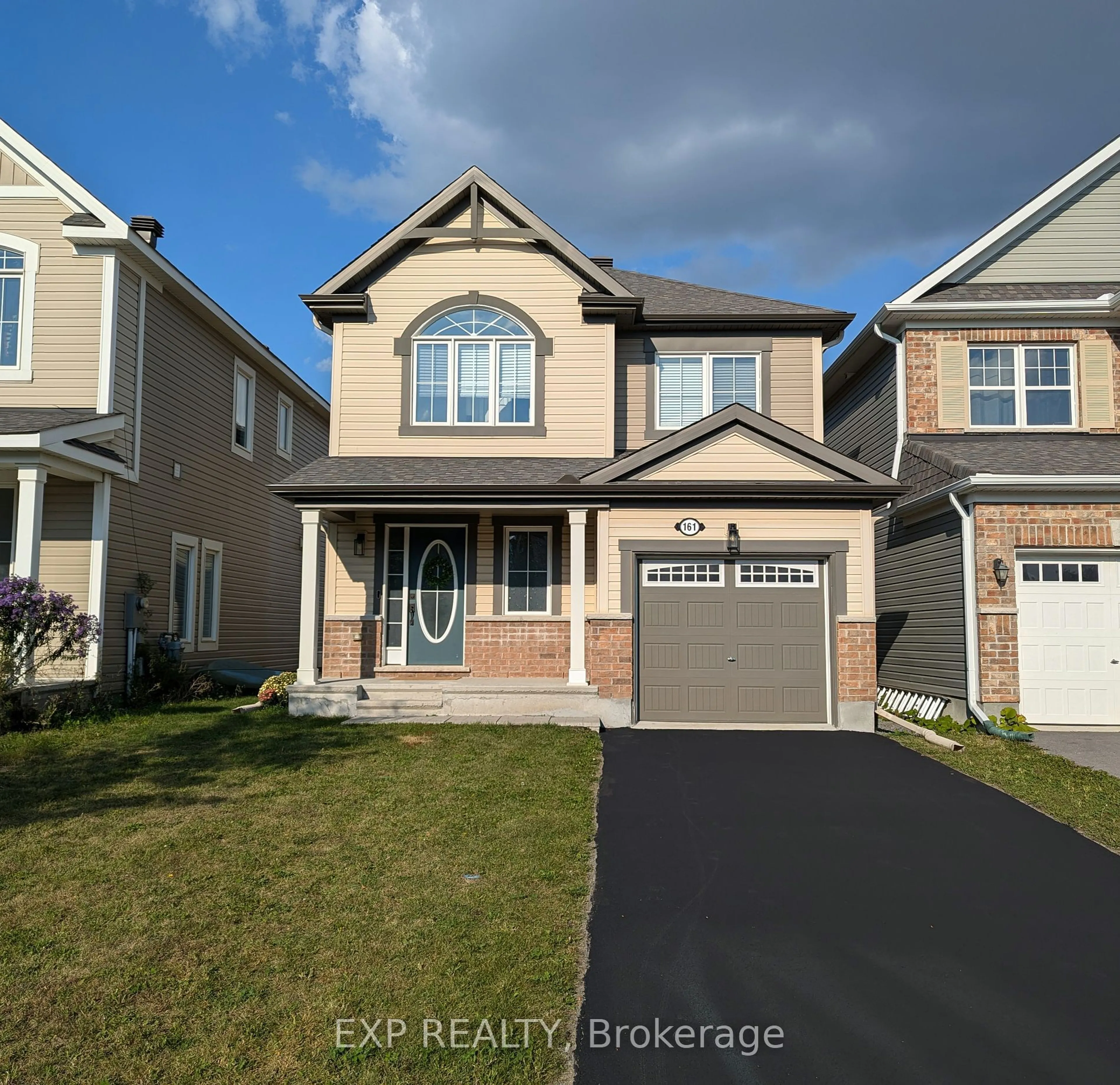 Home with vinyl exterior material, street for 161 Cranesbill Rd, Kanata Ontario K2V 0J4