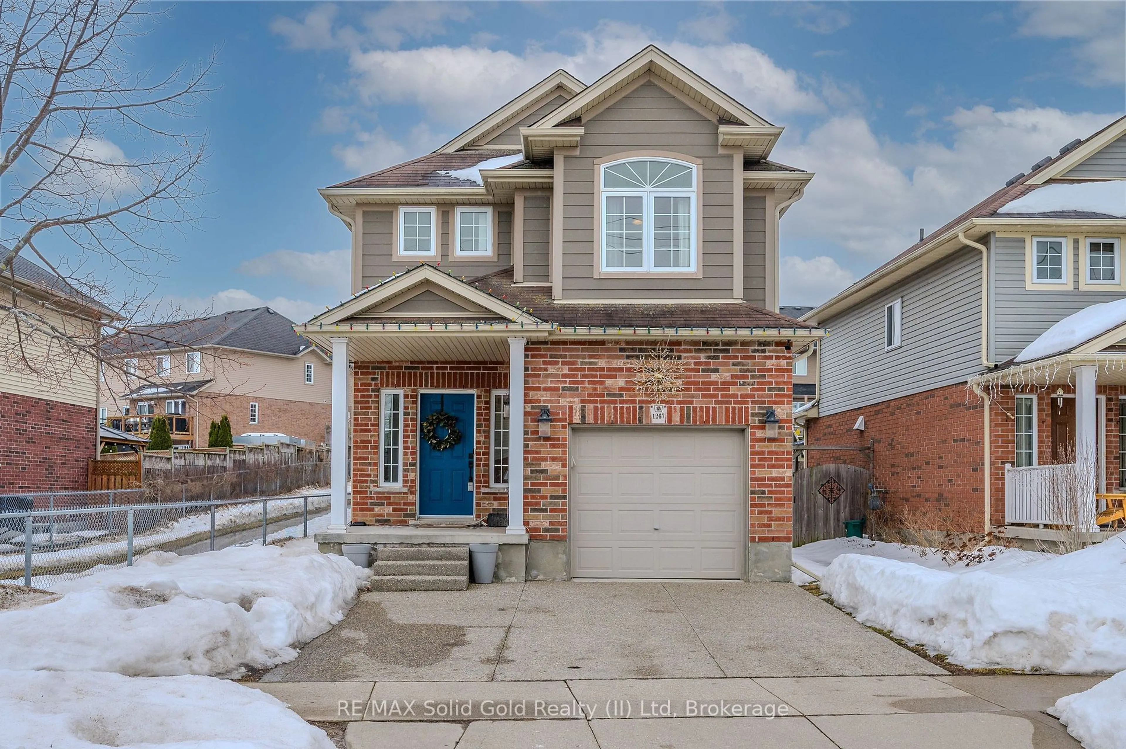 Home with brick exterior material, street for 1267 Old Zeller Dr, Kitchener Ontario N2A 0A2