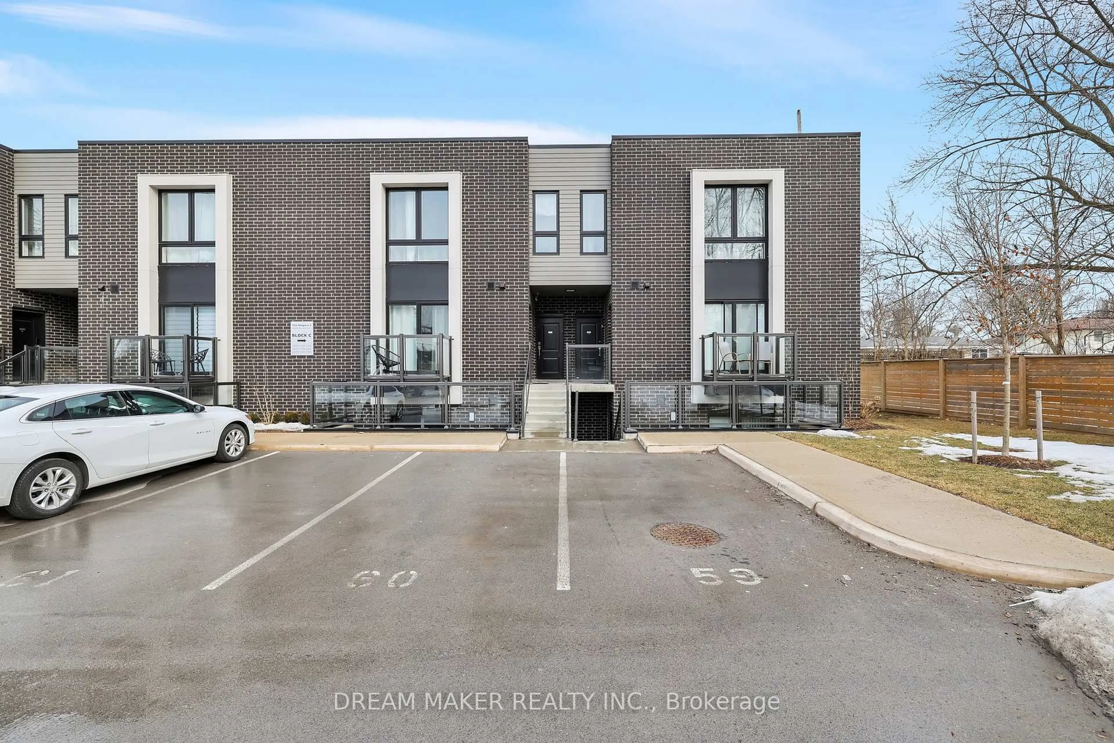 A pic from outside/outdoor area/front of a property/back of a property/a pic from drone, unknown for 6065 Mcleod Rd #106, Niagara Falls Ontario L2G 0Z7