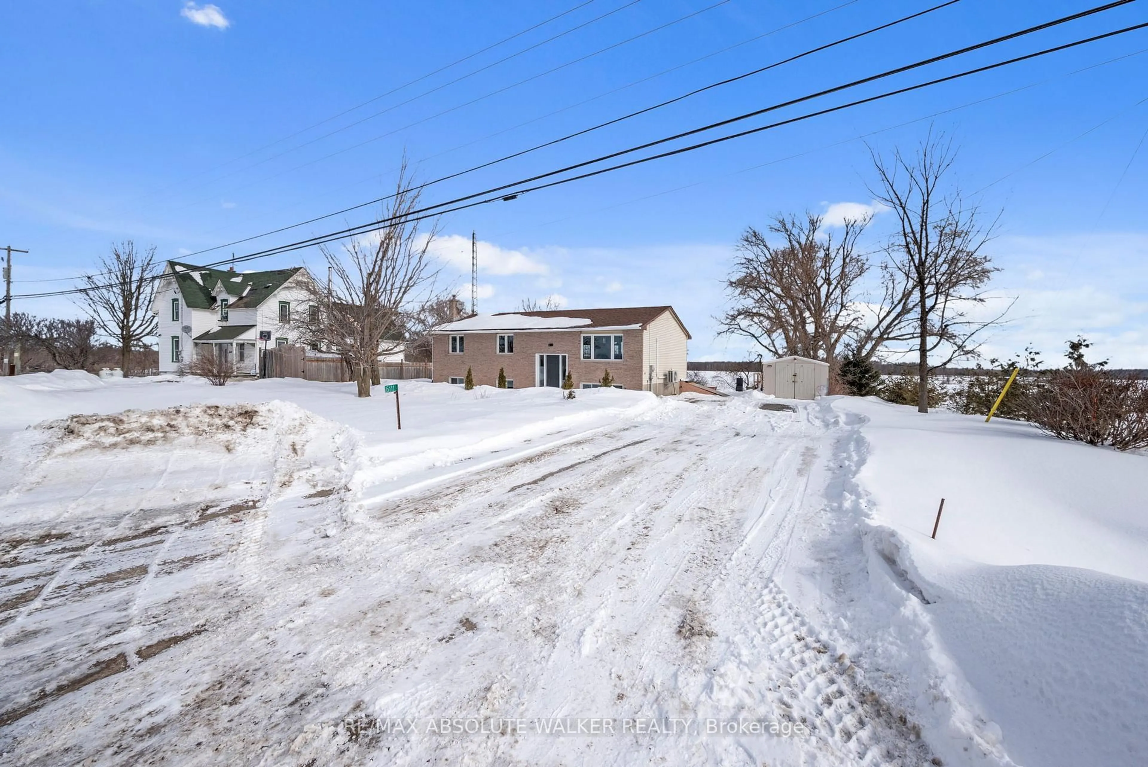 A pic from outside/outdoor area/front of a property/back of a property/a pic from drone, street for 6111 Prince Of Wales Dr, Manotick - Kars - Rideau Twp and Area Ontario K0A 2T0